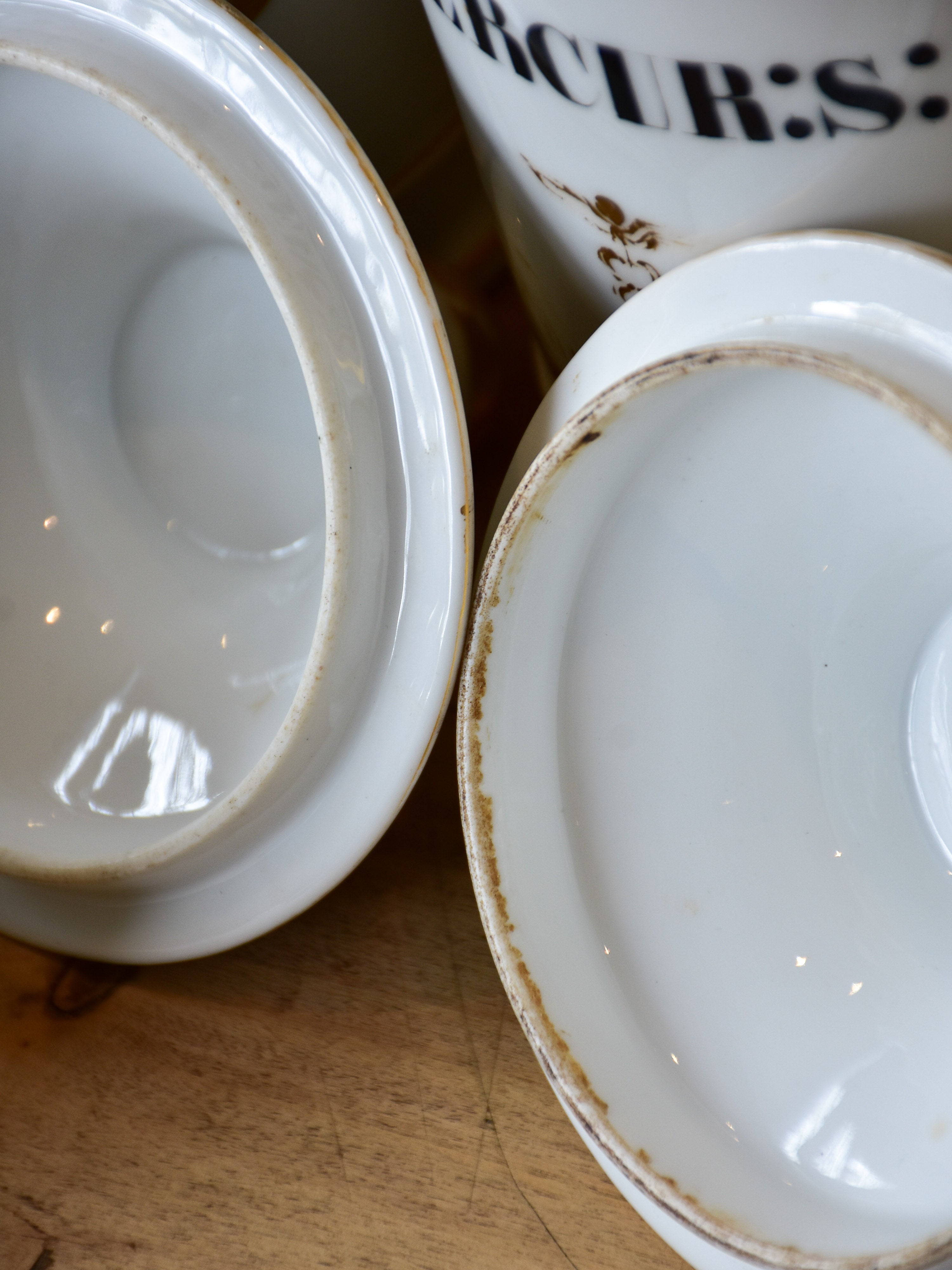 Set of seven French porcelain apothecary jars