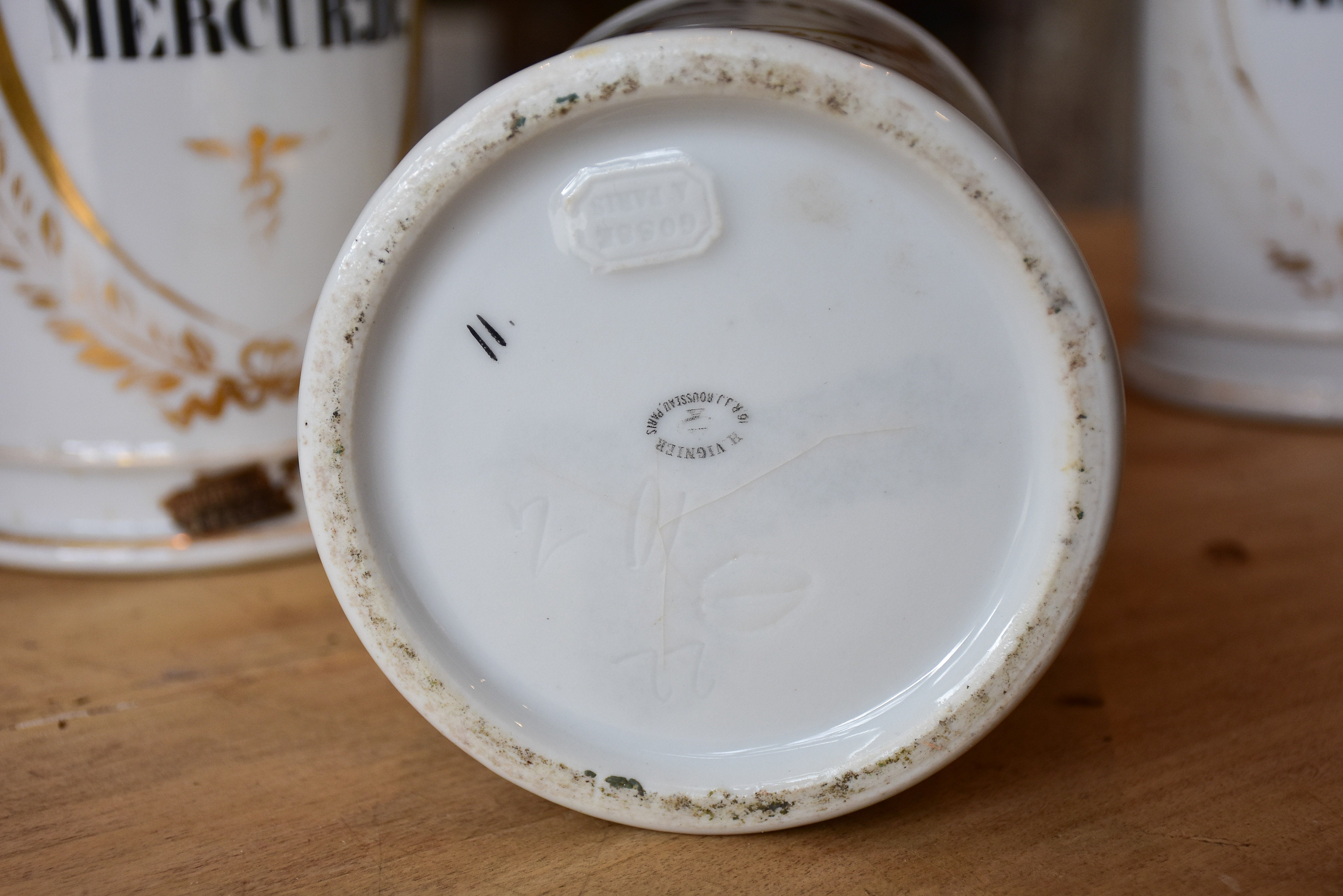 Set of seven French porcelain apothecary jars