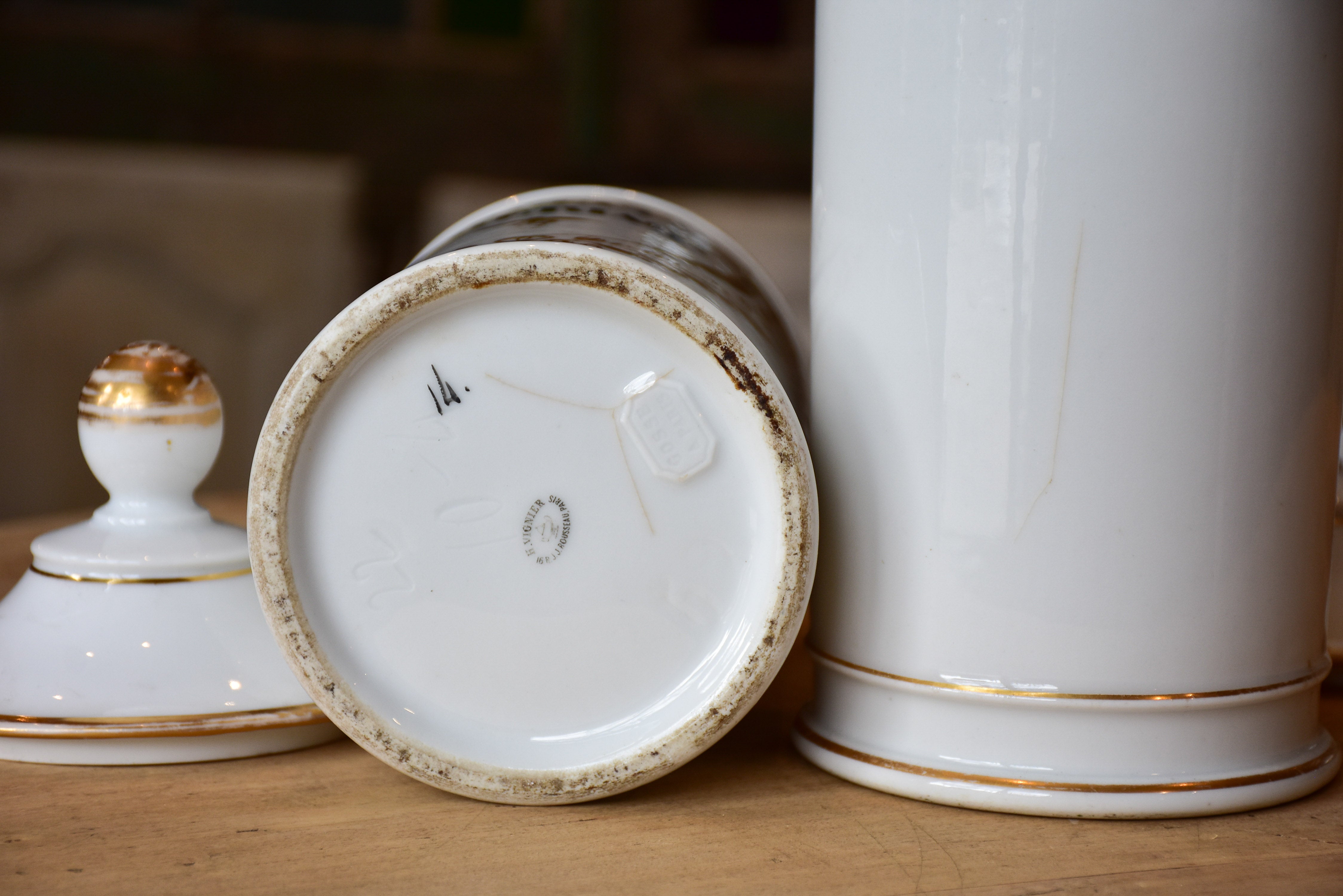 Set of seven French porcelain apothecary jars