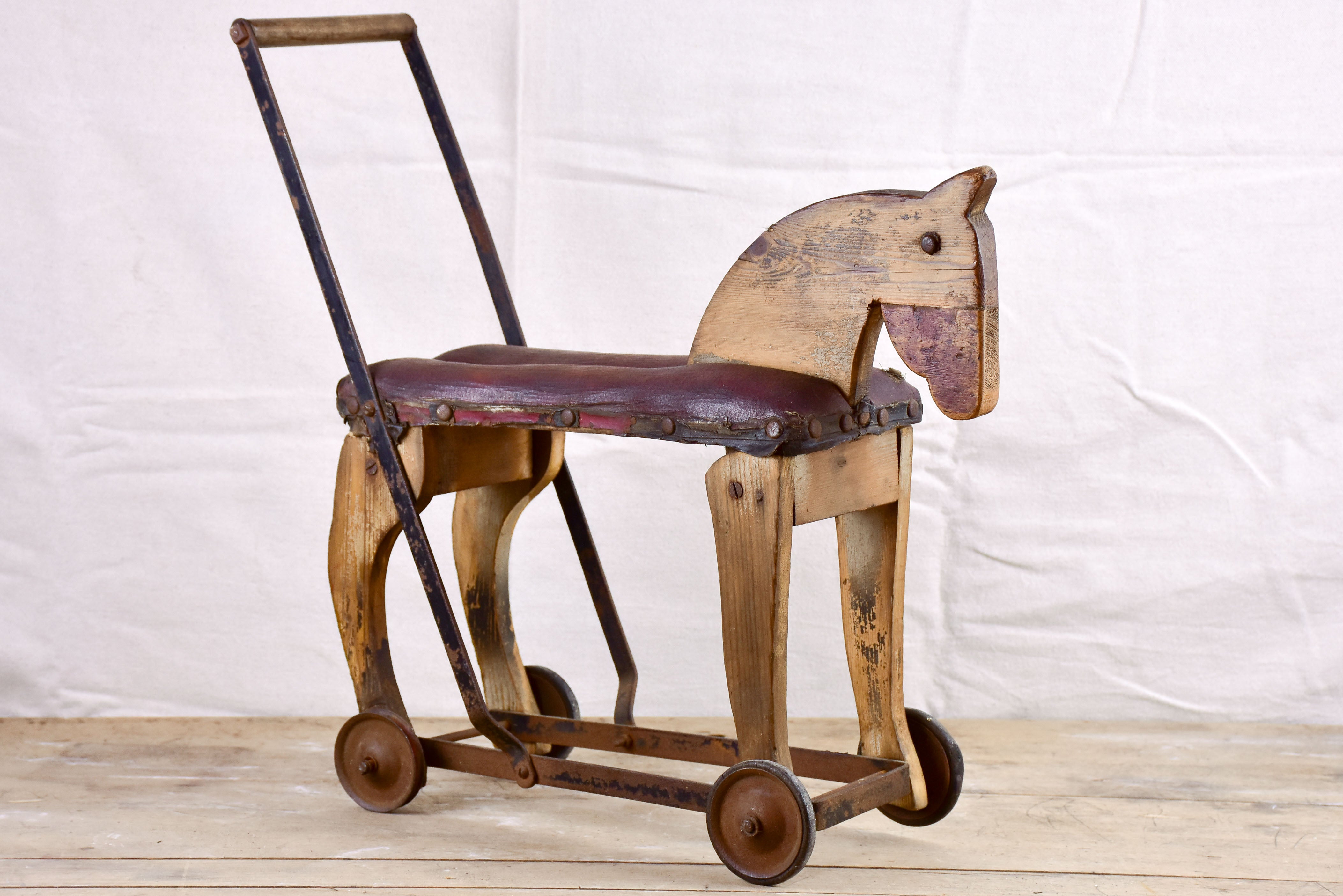 Folk art French toy horse on wheels