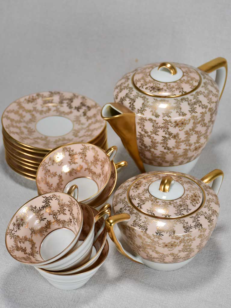 Superb twentieth century pink and gold Limoges tea service