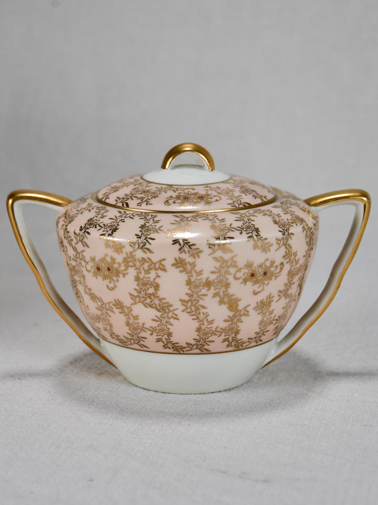 Superb twentieth century pink and gold Limoges tea service