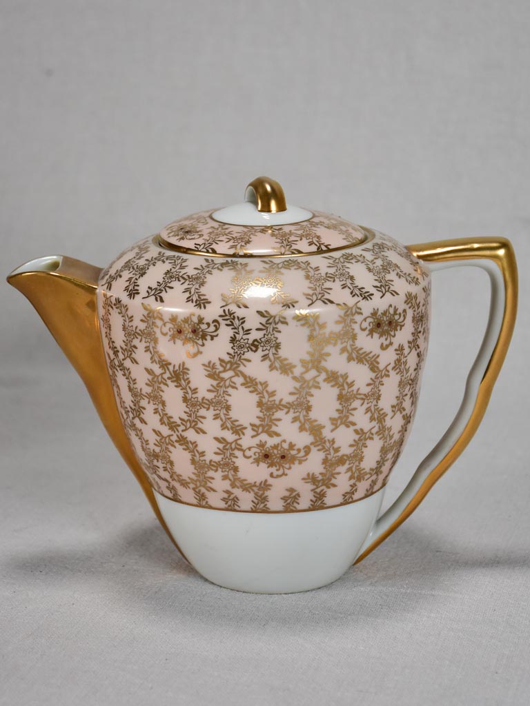 Superb twentieth century pink and gold Limoges tea service