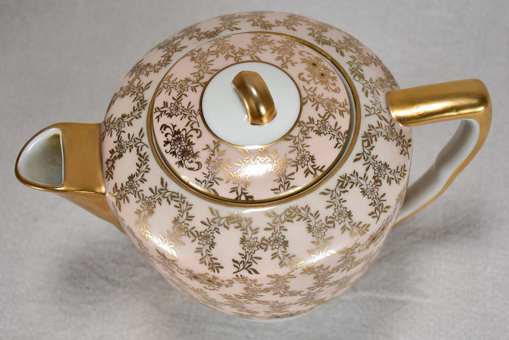 Superb twentieth century pink and gold Limoges tea service