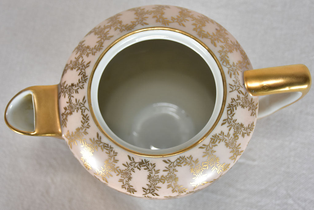 Superb twentieth century pink and gold Limoges tea service