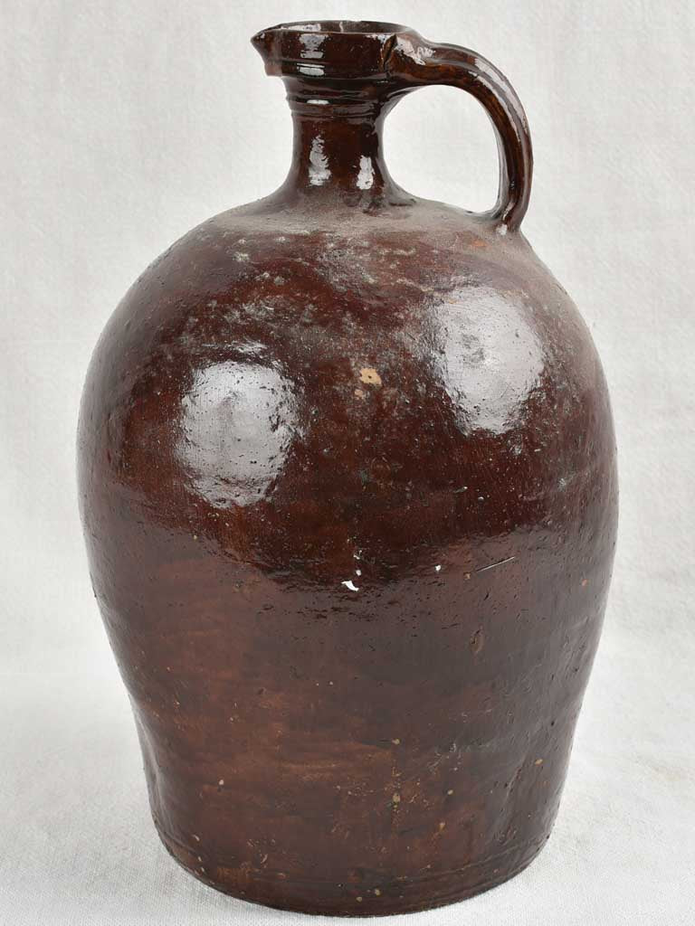 18th century French vinegar jug with dark brown glaze 13"