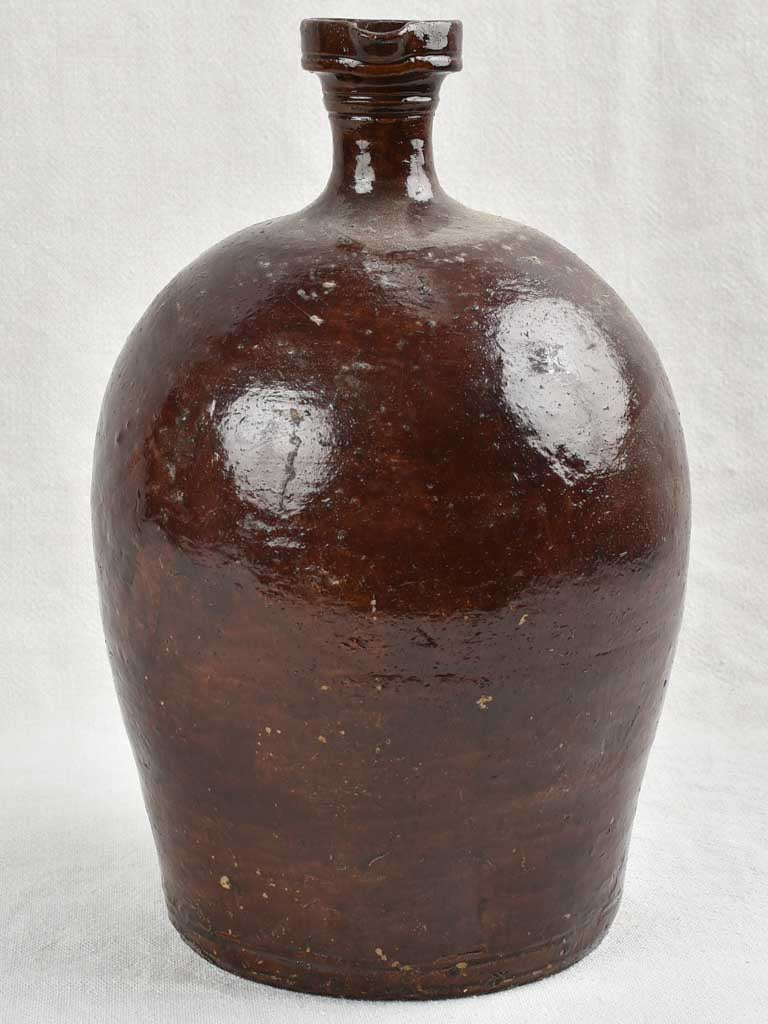 18th century French vinegar jug with dark brown glaze 13"