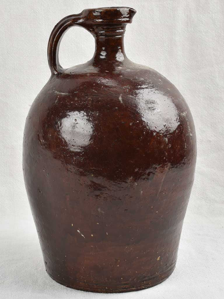 18th century French vinegar jug with dark brown glaze 13"