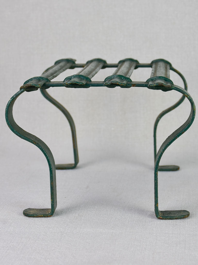 Pair of cast iron foot rests from the 19th century with green patina 8¾" x 11¾"