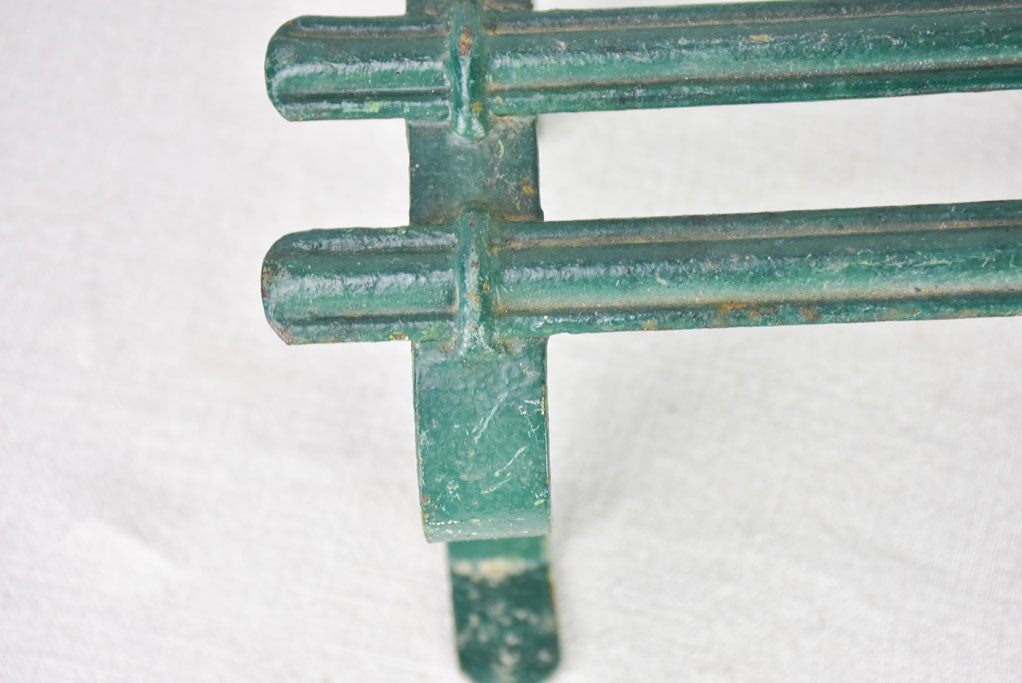 Pair of cast iron foot rests from the 19th century with green patina 8¾" x 11¾"