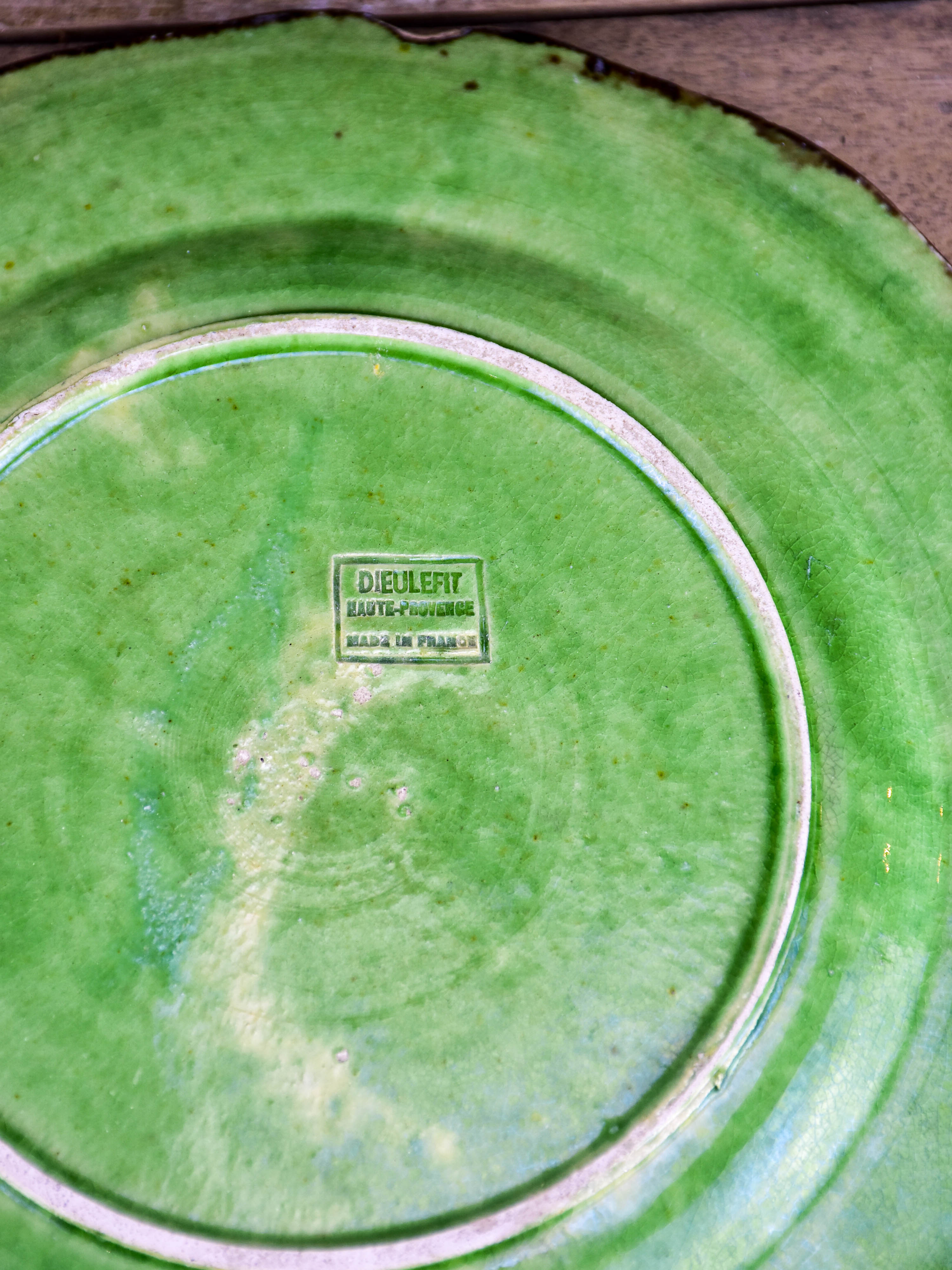 Collection of vintage green plates by Etienne Noël, Dieulefit