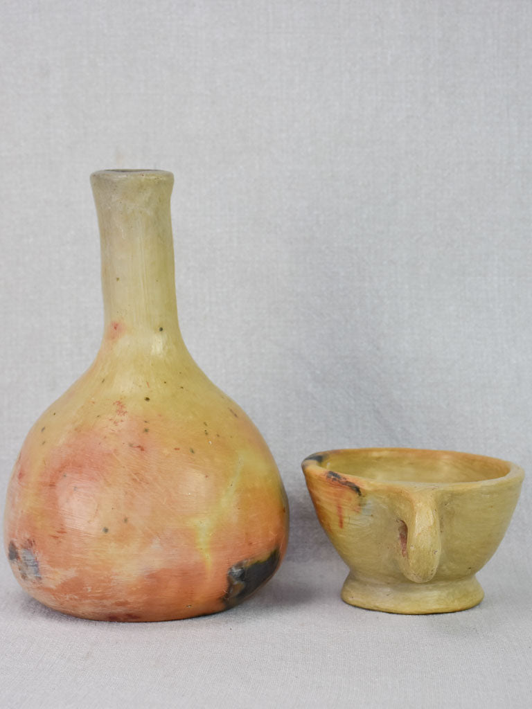 Two artisan-made ceramics made from wood-fired clay - vase and cup