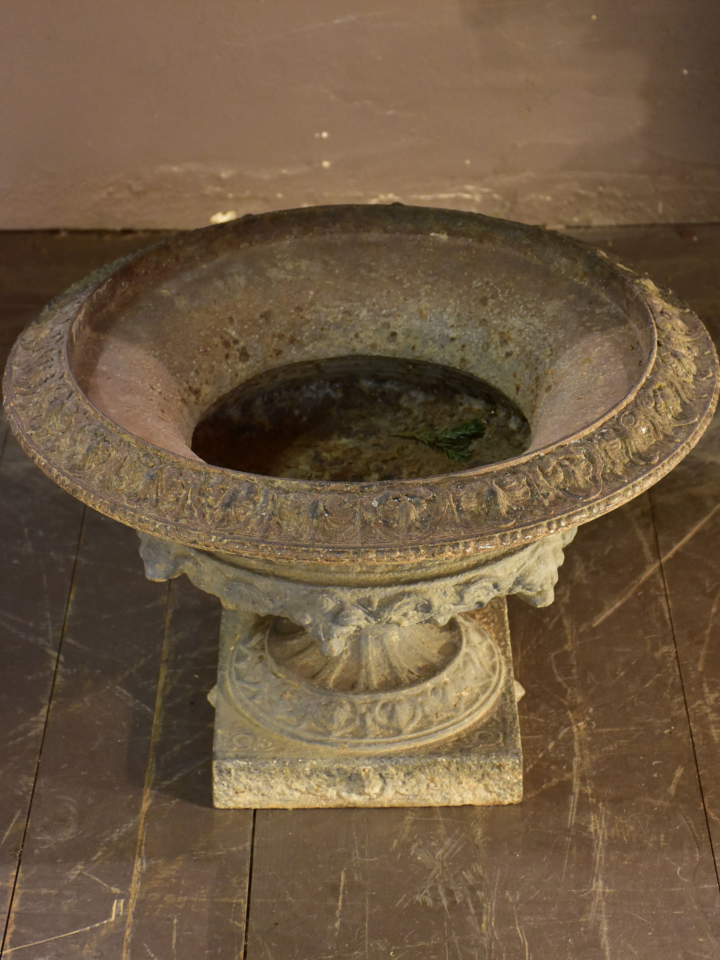 Large grey Medici urn with lions heads