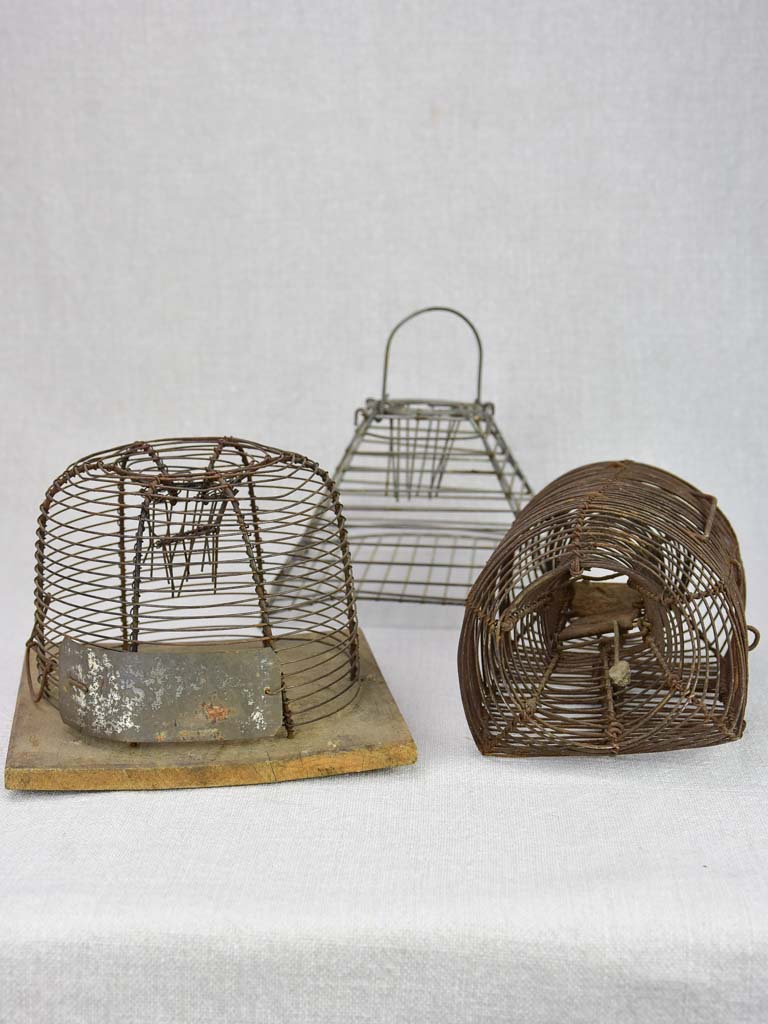 Collection of three early 20th century mouse traps