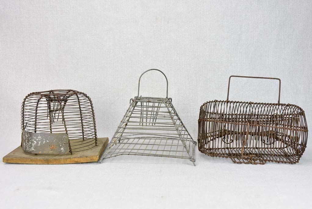 Collection of three early 20th century mouse traps