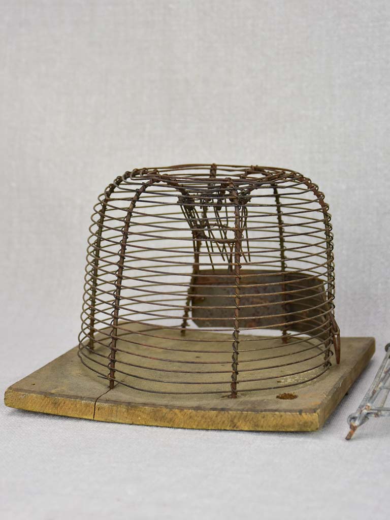 Collection of three early 20th century mouse traps