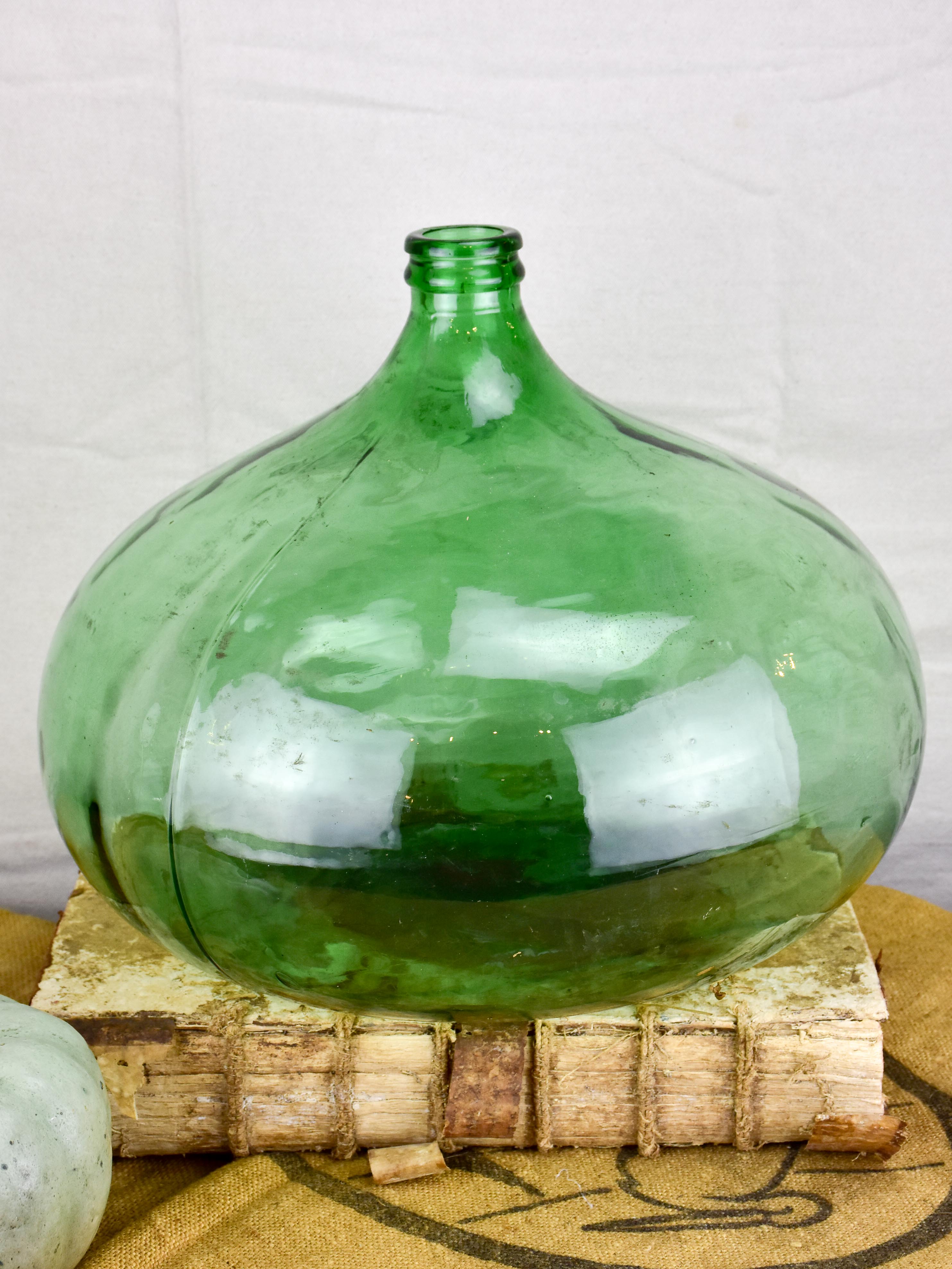 Vintage French demijohn with green glass