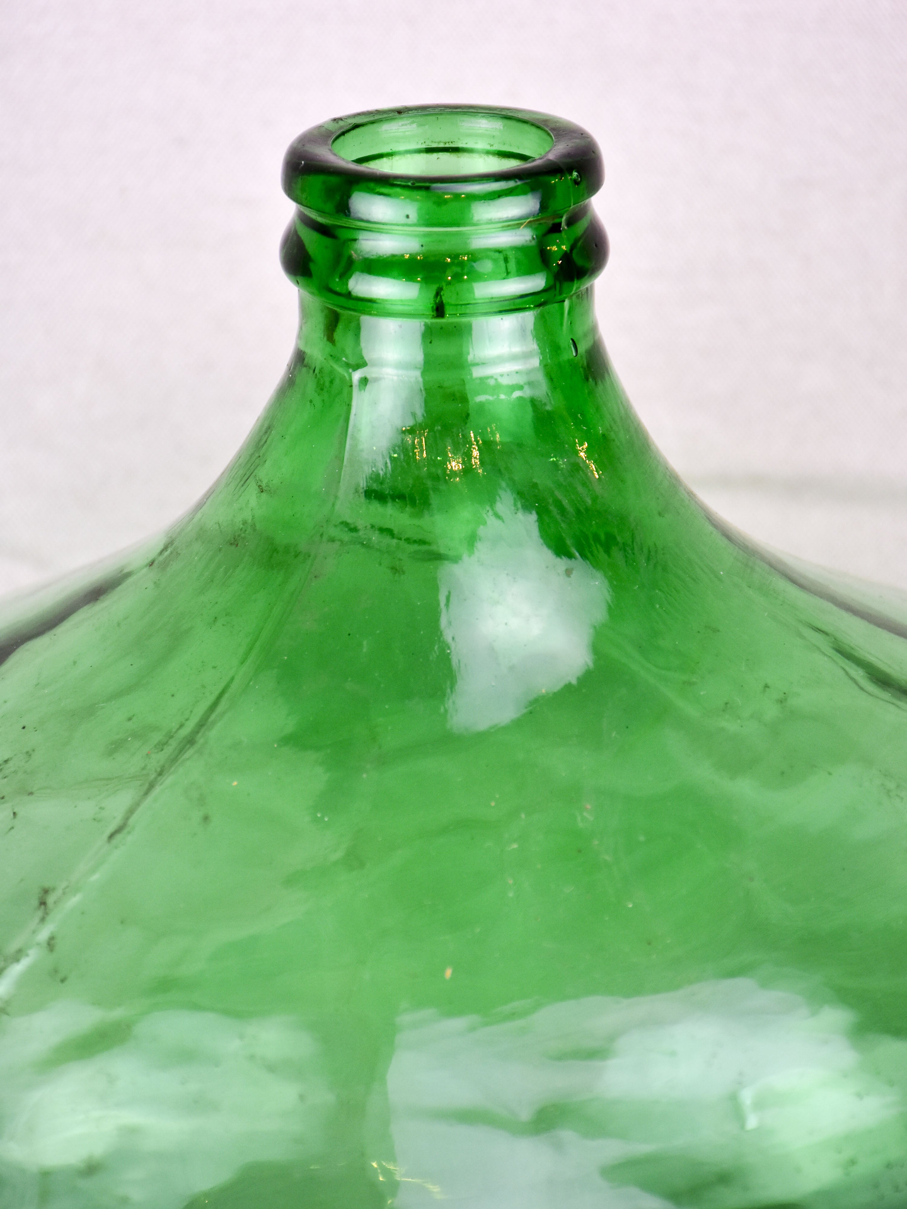 Vintage French demijohn with green glass