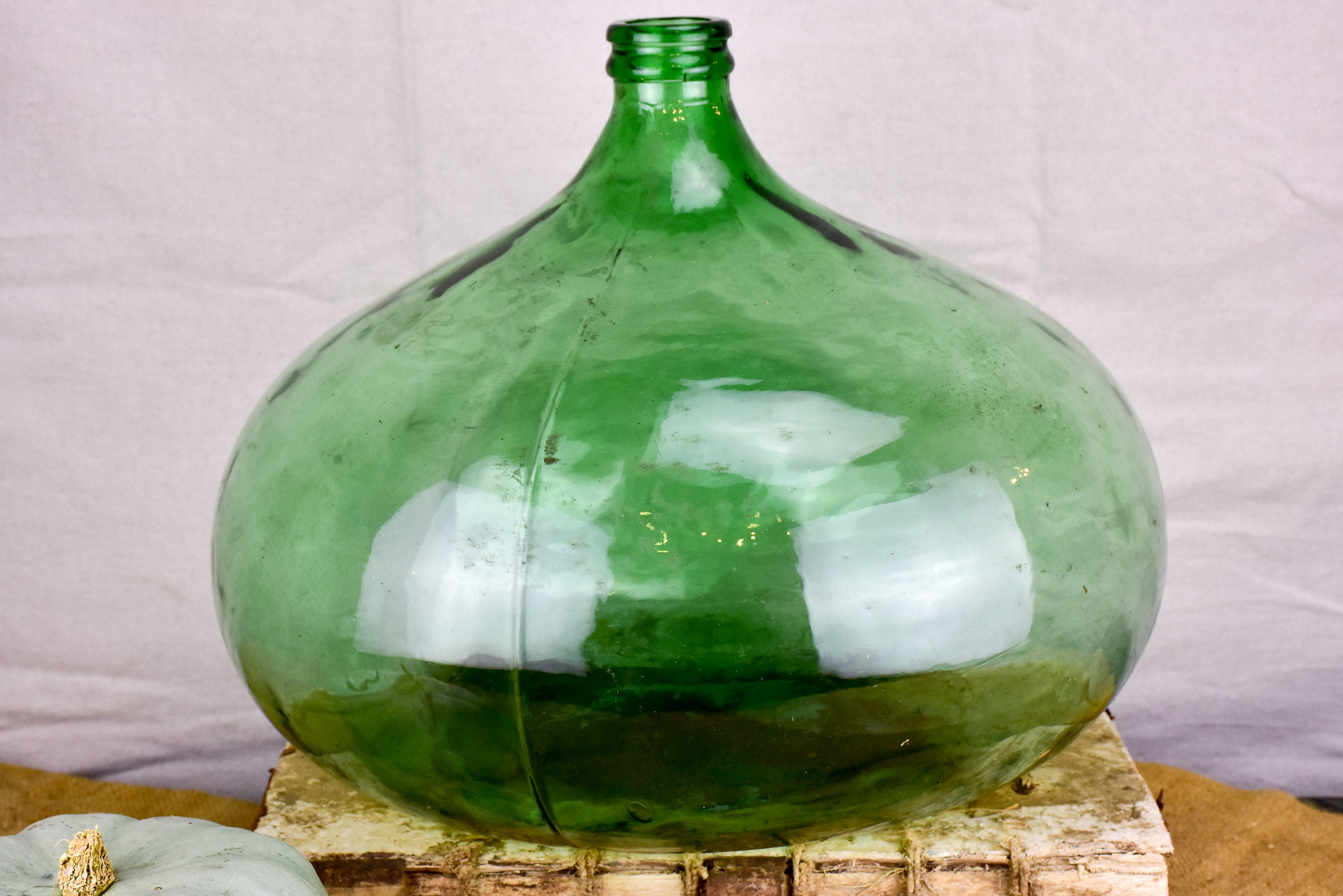 Vintage French demijohn with green glass