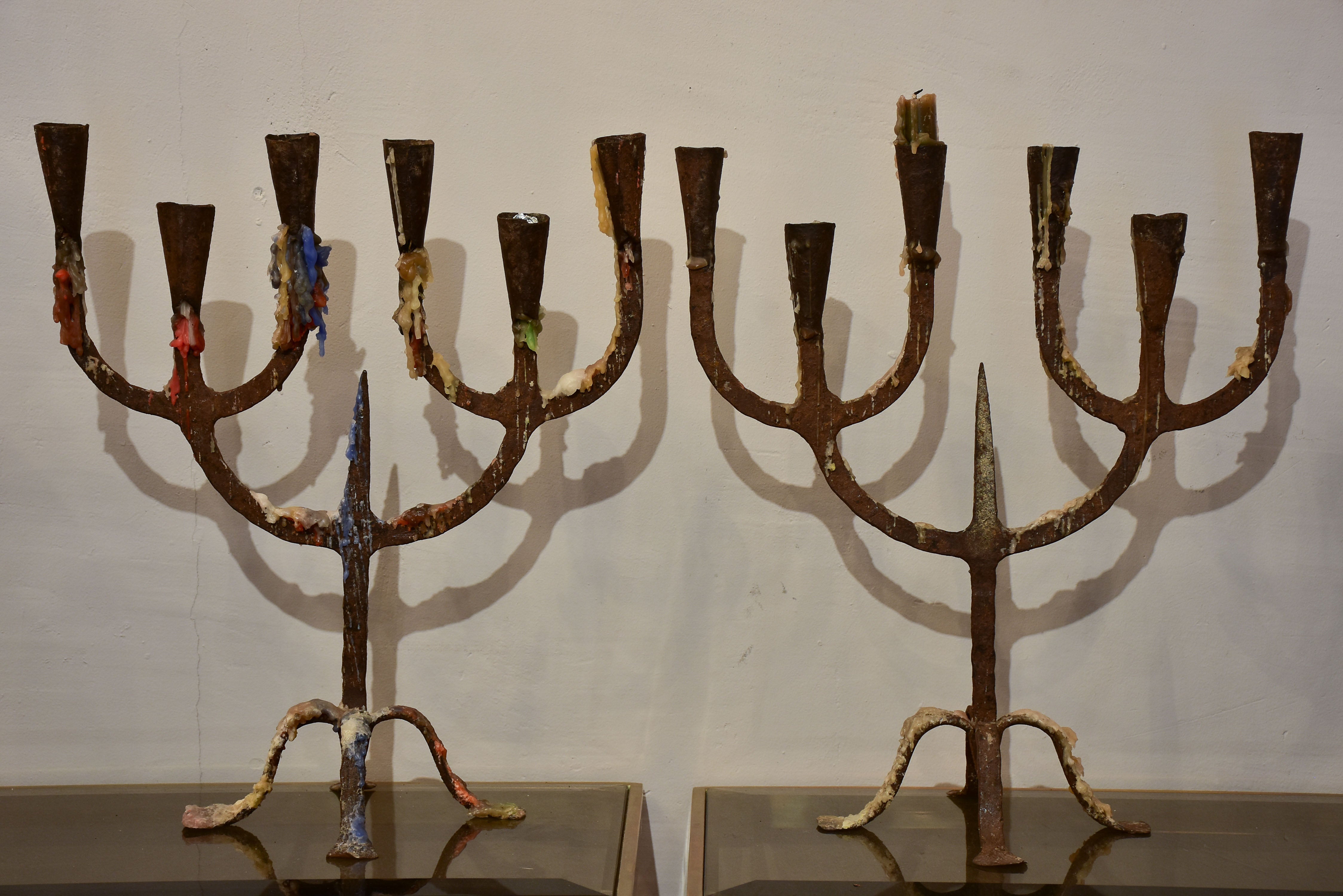 Pair of antique wrought iron candelabras