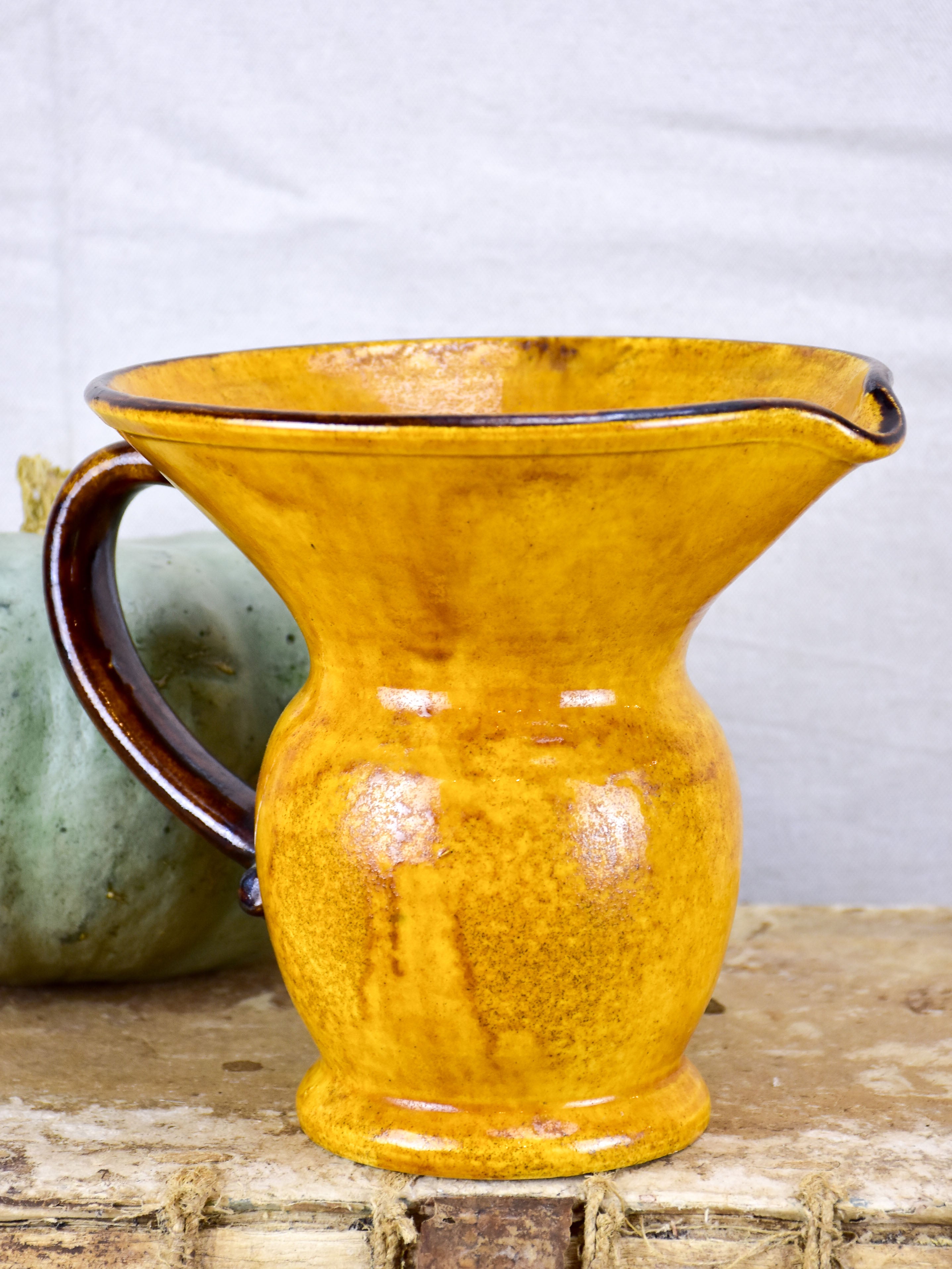 Vintage French pitcher / vase with orange glaze