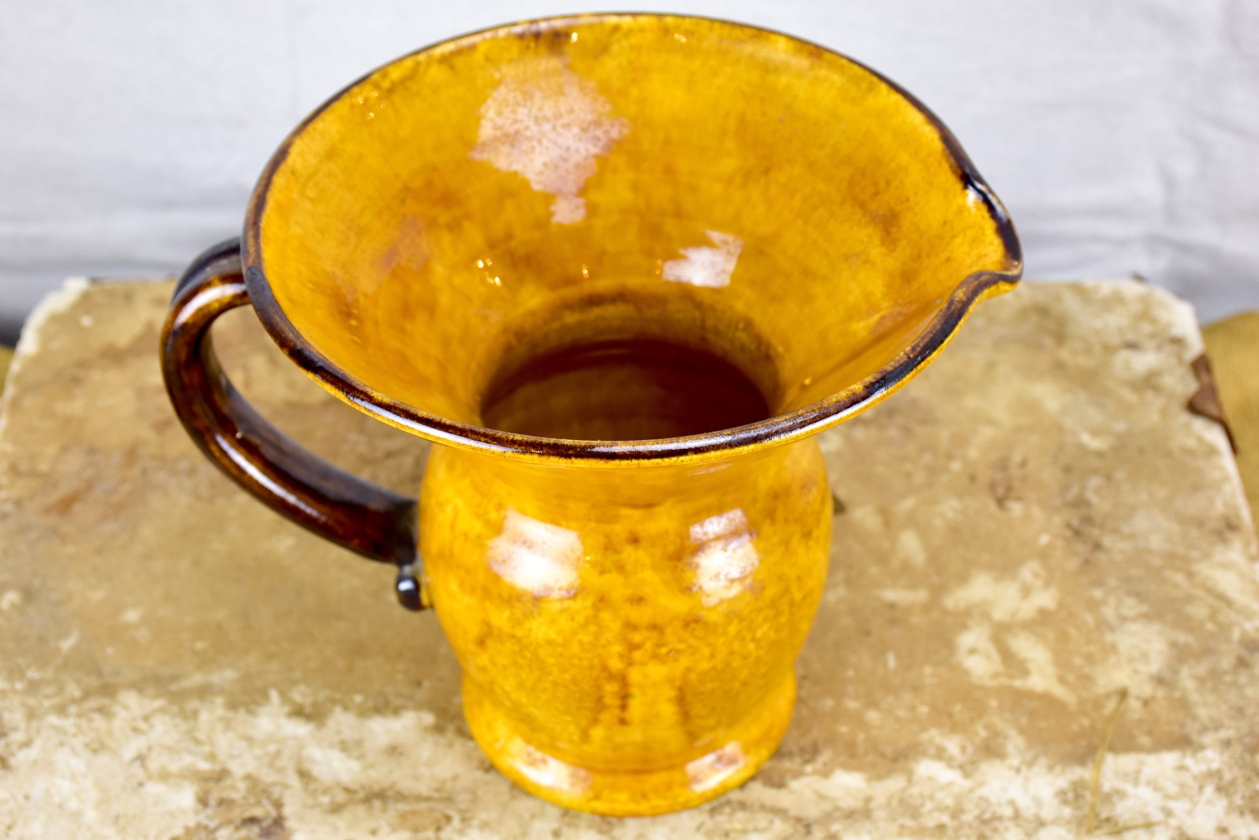 Vintage French pitcher / vase with orange glaze