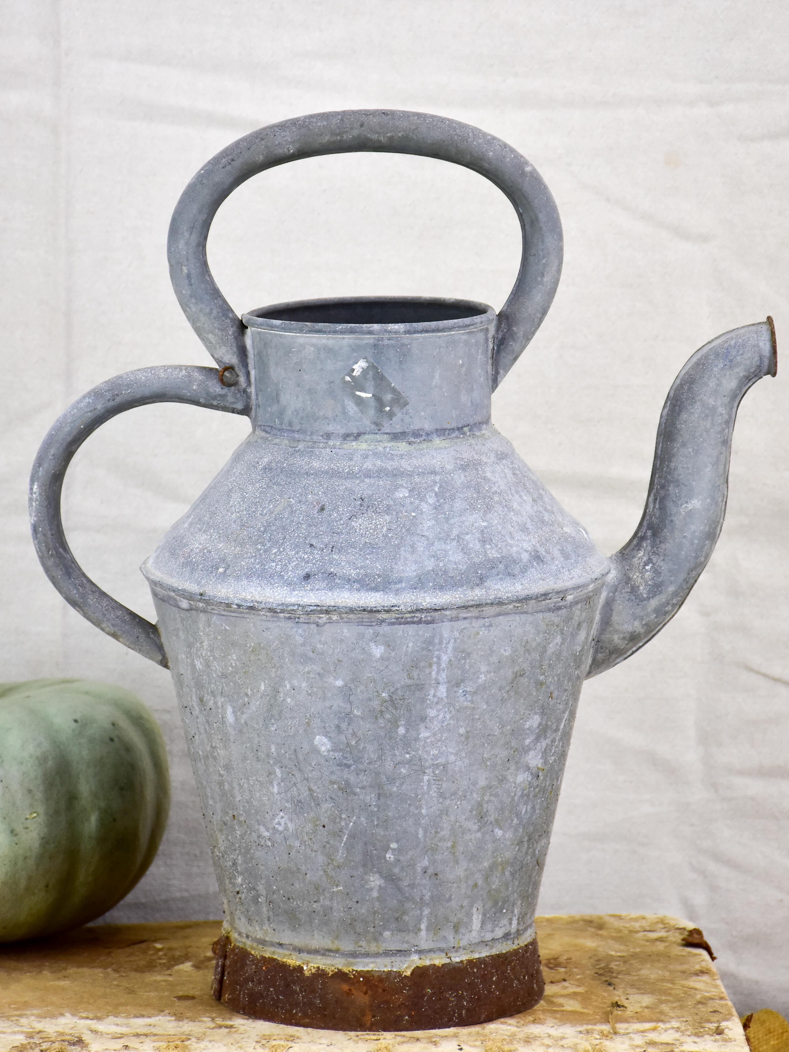 Antique French watering can with two handles