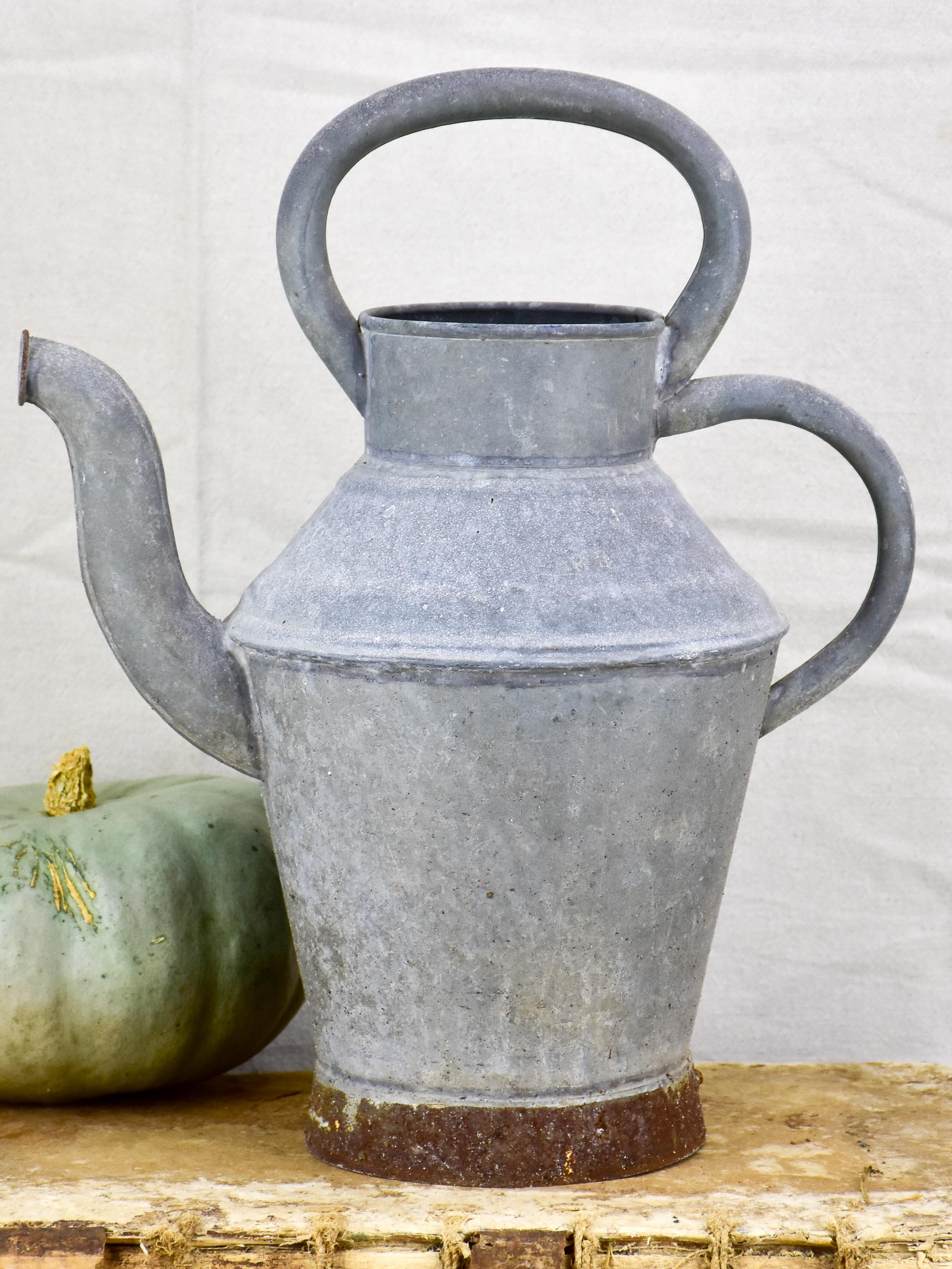 Antique French watering can with two handles