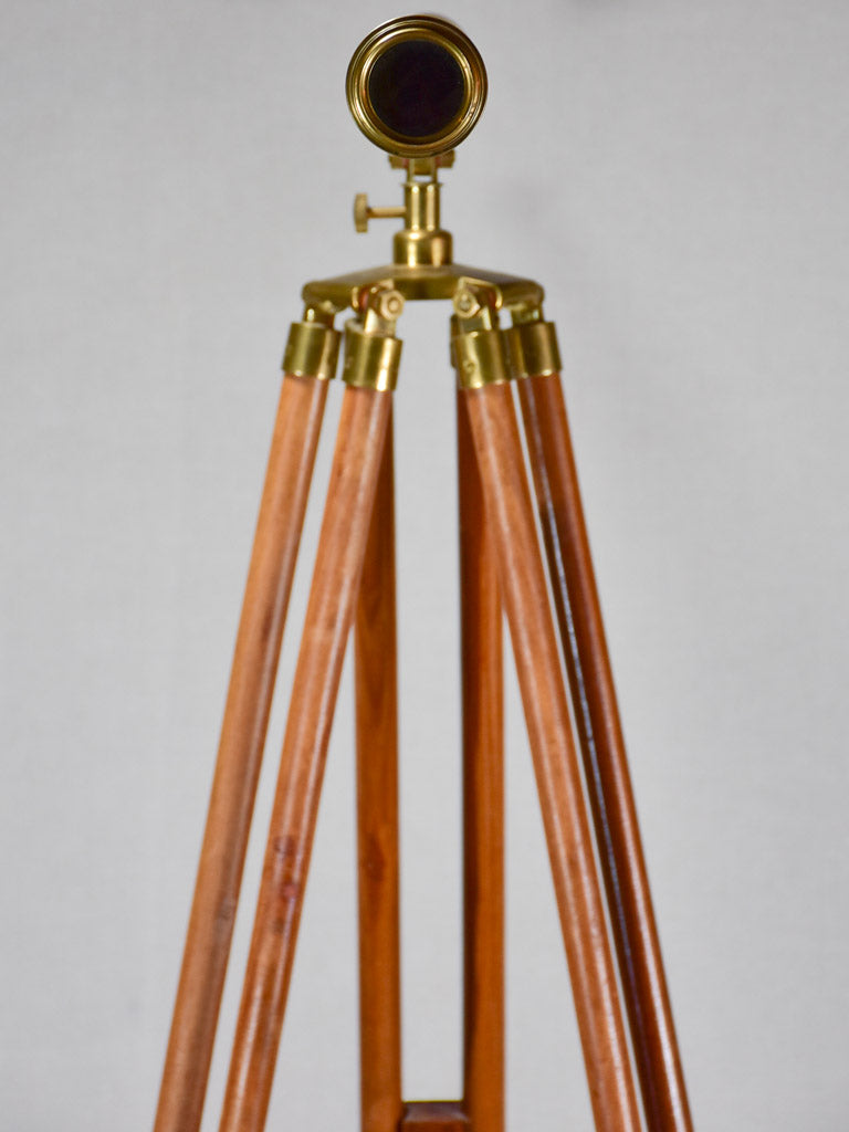 Vintage telescope on wooden tripod