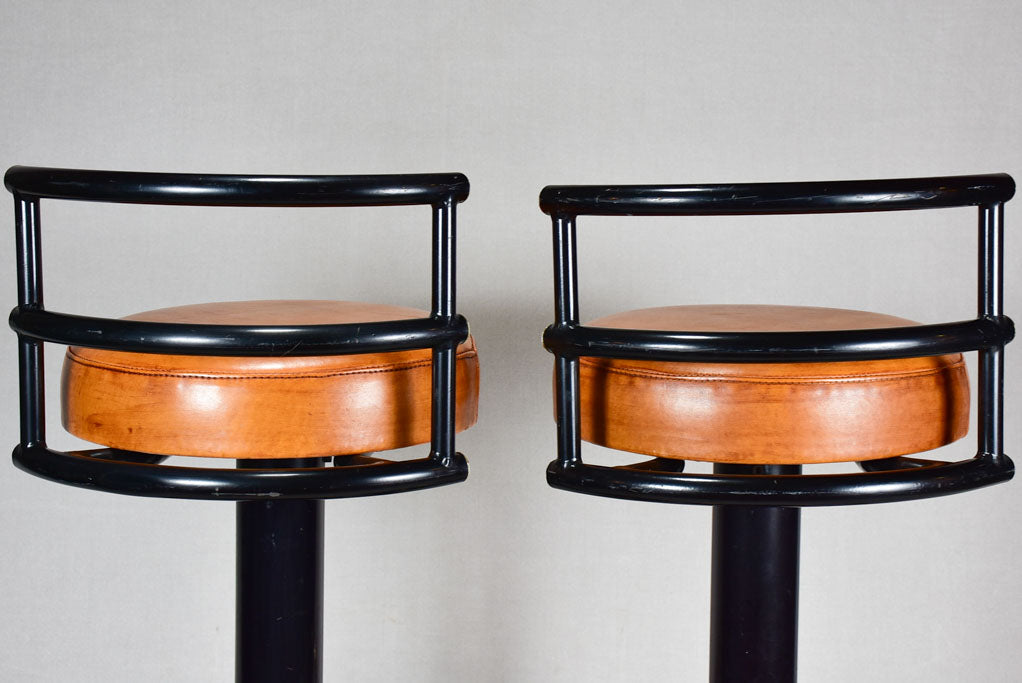 Three 1960s French leather barstools