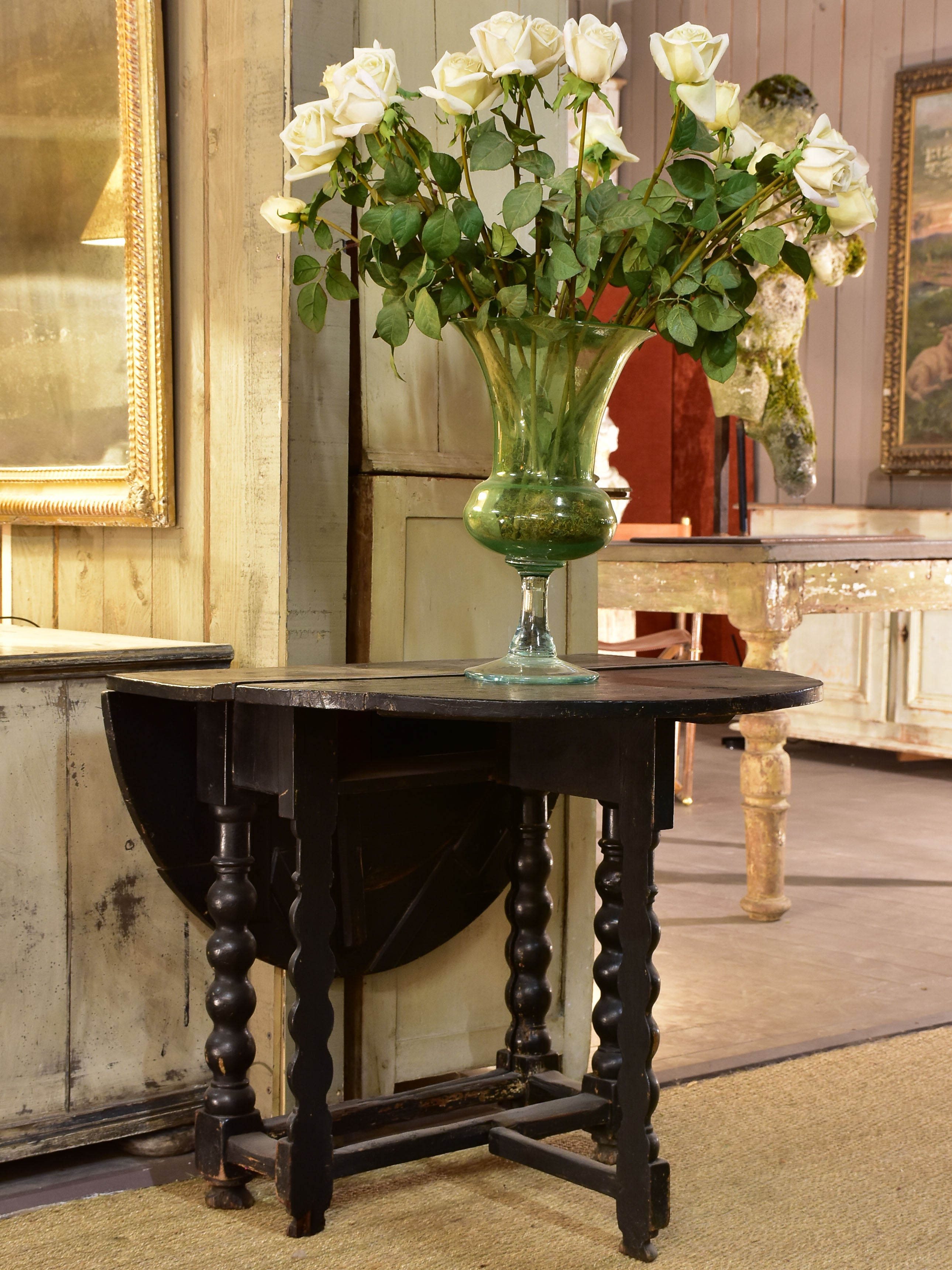 Black drop leaf table Louis XIV