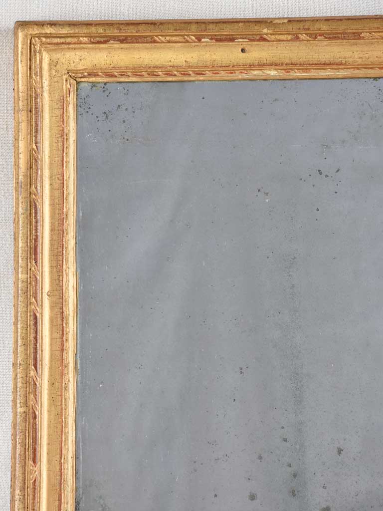 Antique Louis XVI style reflective mirror