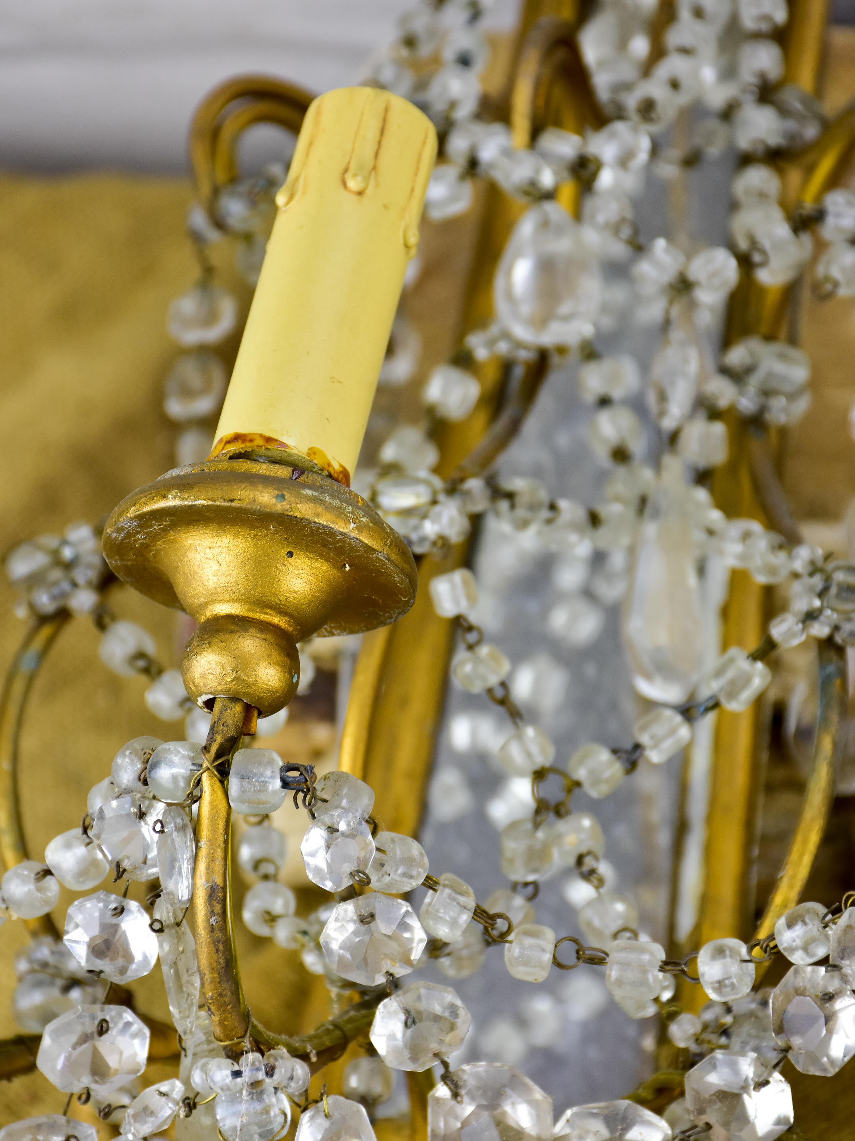 Pair of antique Italian wall sconces with pendants and mirrored backs