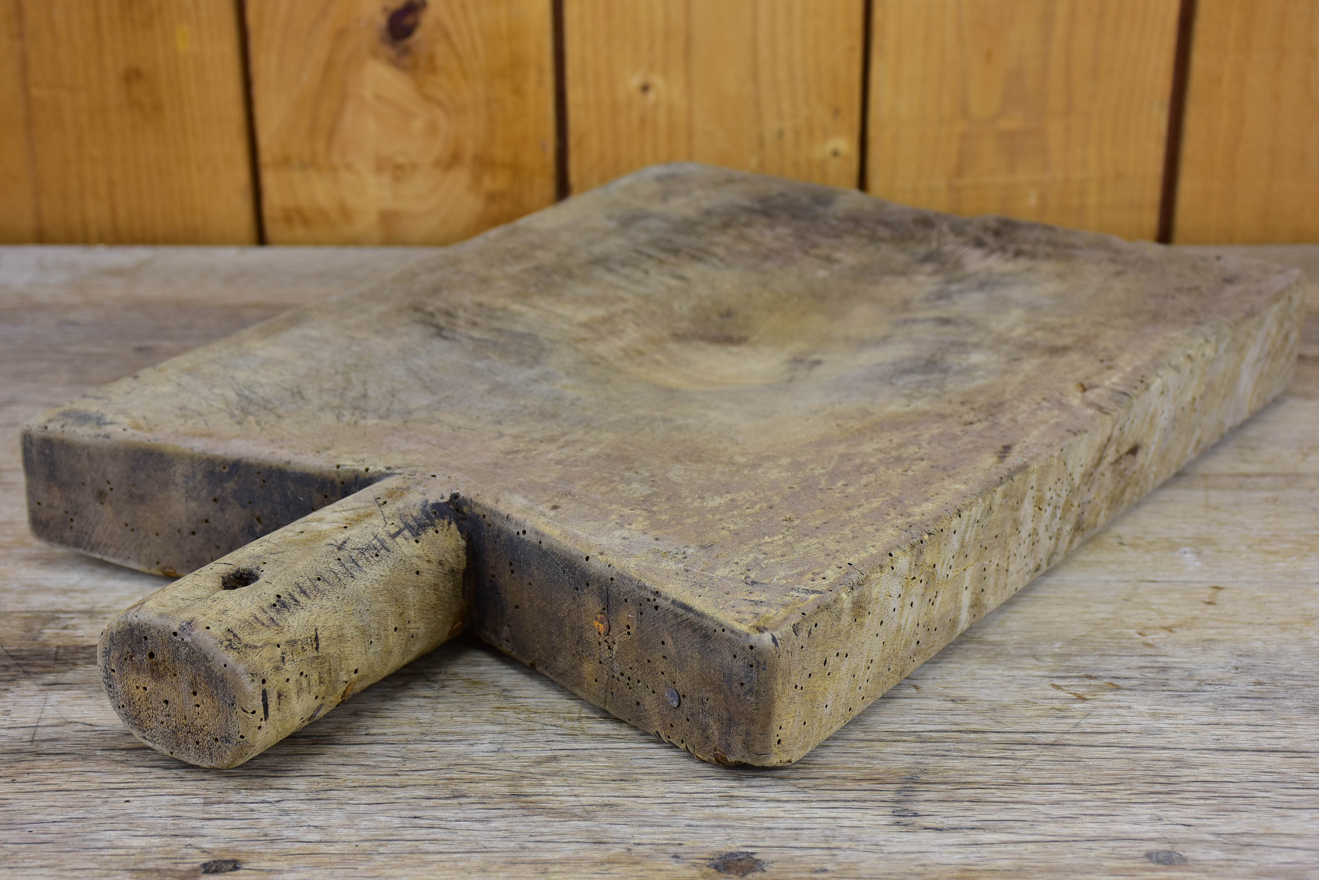 Antique French cutting board with peaked shoulders