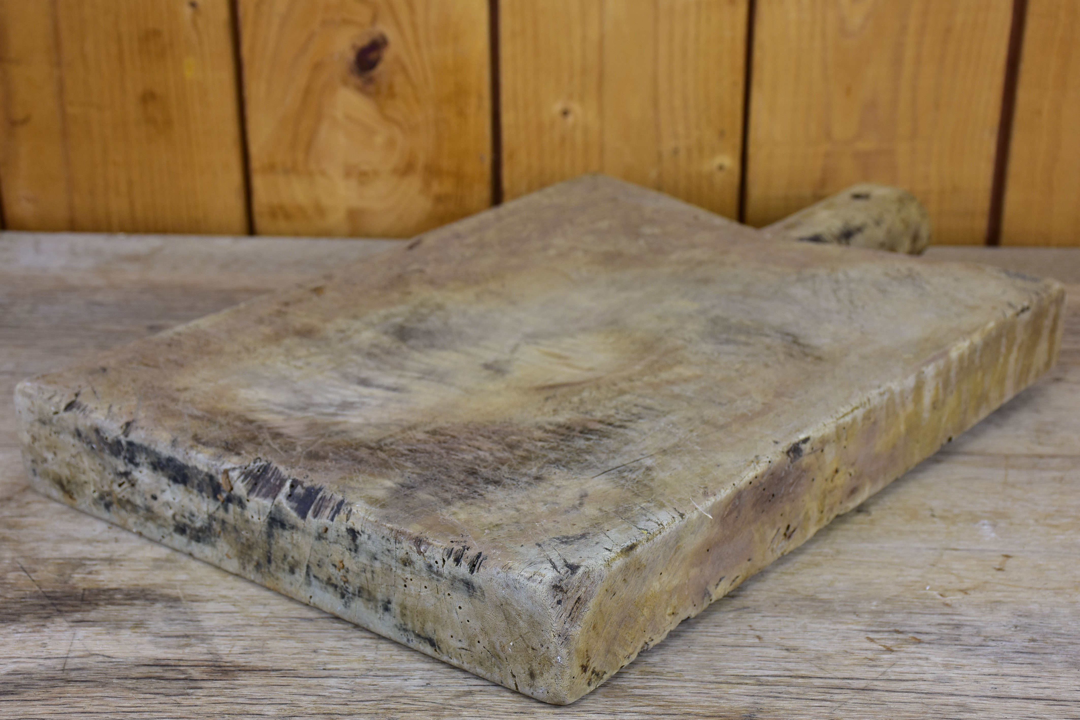 Antique French cutting board with peaked shoulders