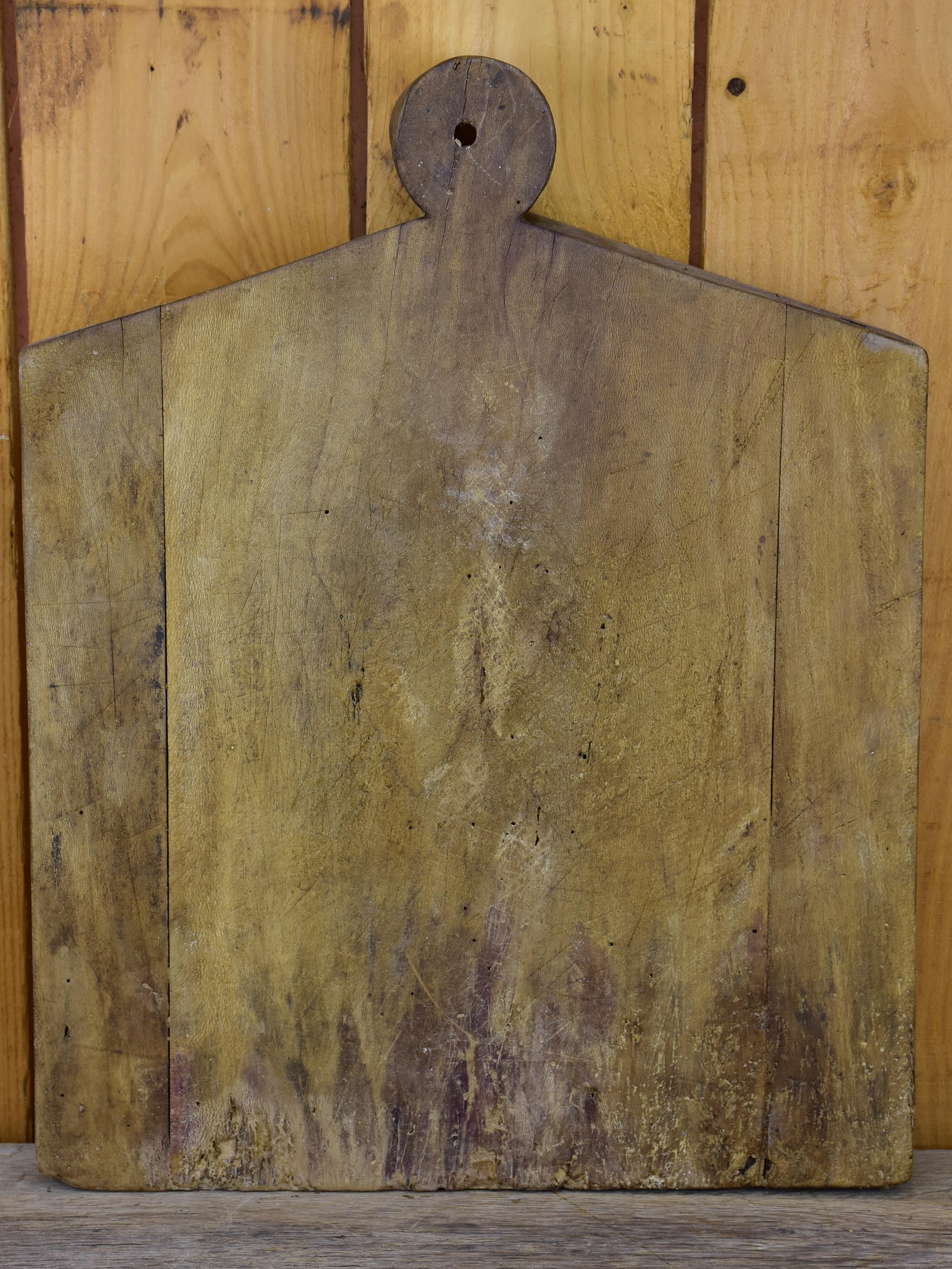 Antique French cutting board in the shape of a coat hanger