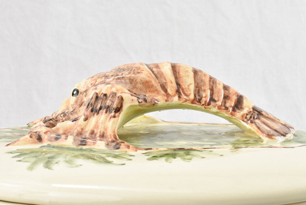 Large oval bouillabaisse tureen with lobster handle