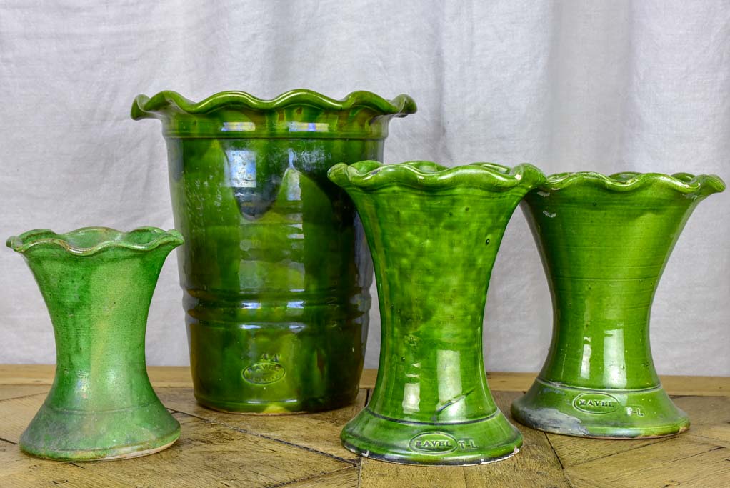 Set of four vintage French florist vases with green glaze and rippled necks