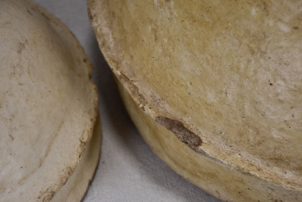 Two African grain stores in paper mache