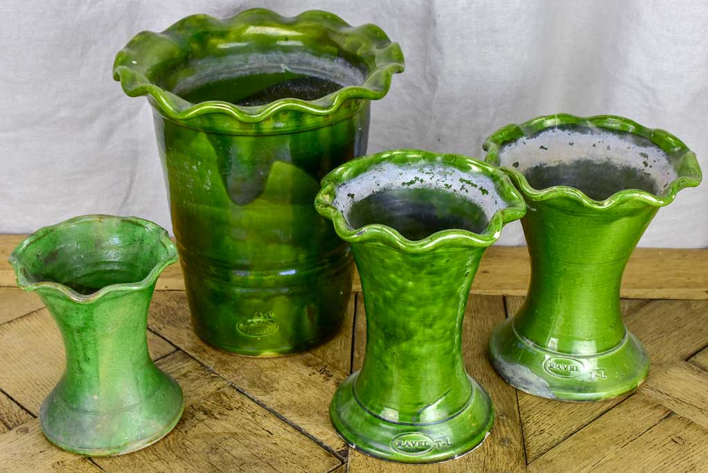 Set of four vintage French florist vases with green glaze and rippled necks