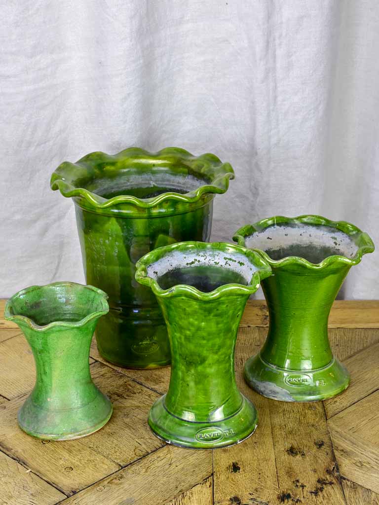 Set of four vintage French florist vases with green glaze and rippled necks