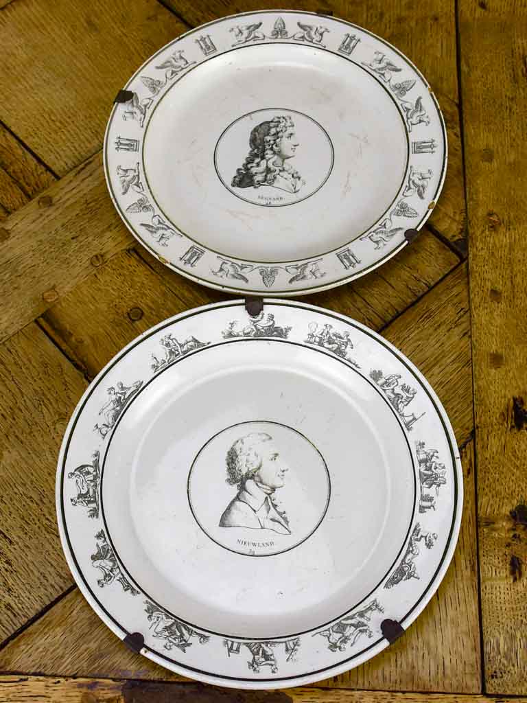 Pair of faience plates from Paris with profile portraits