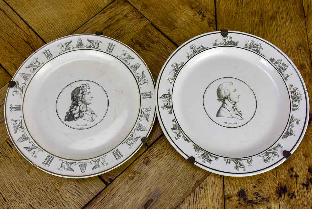 Pair of faience plates from Paris with profile portraits