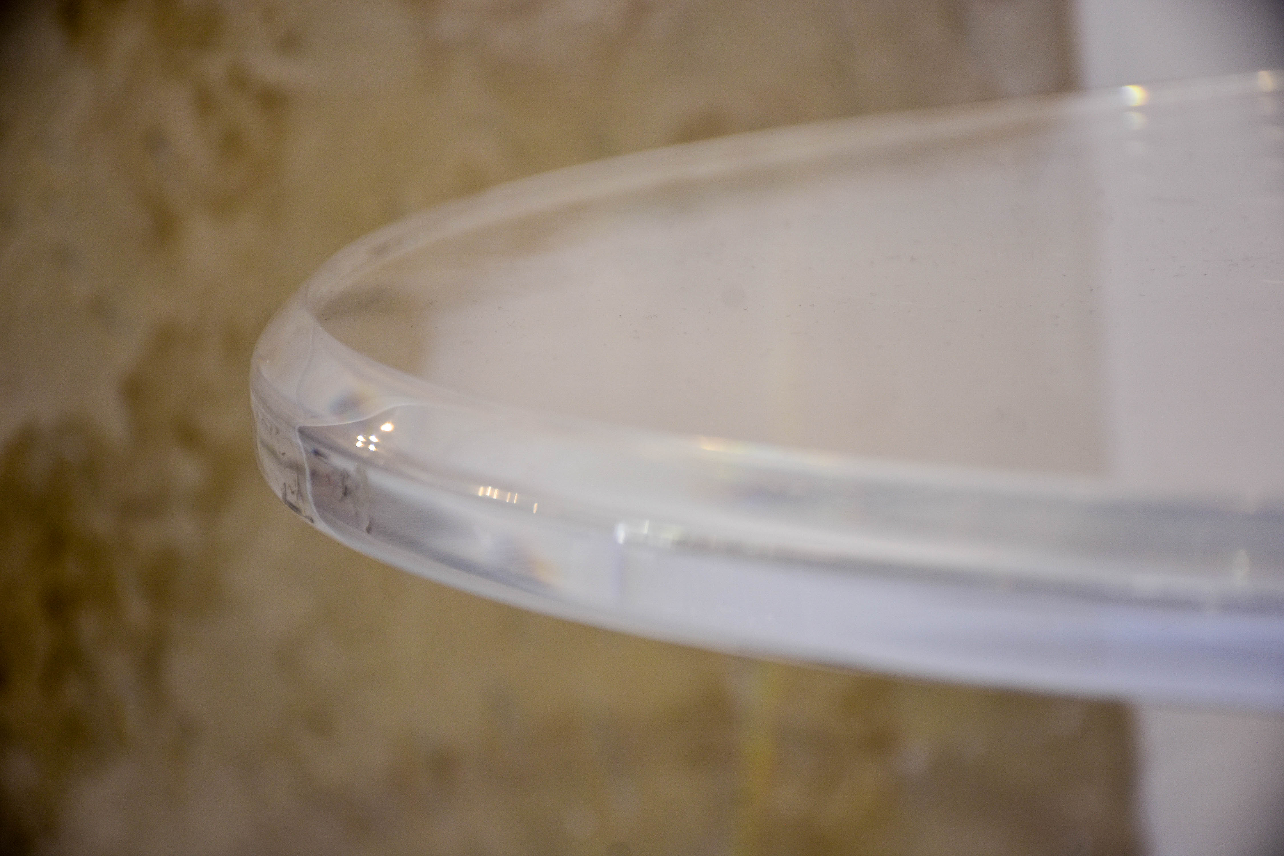 Vintage round side table in perspex and brass