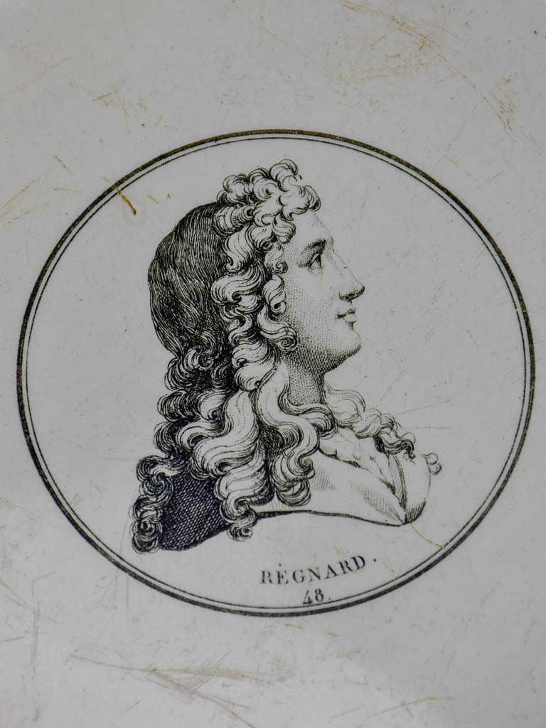 Pair of faience plates from Paris with profile portraits