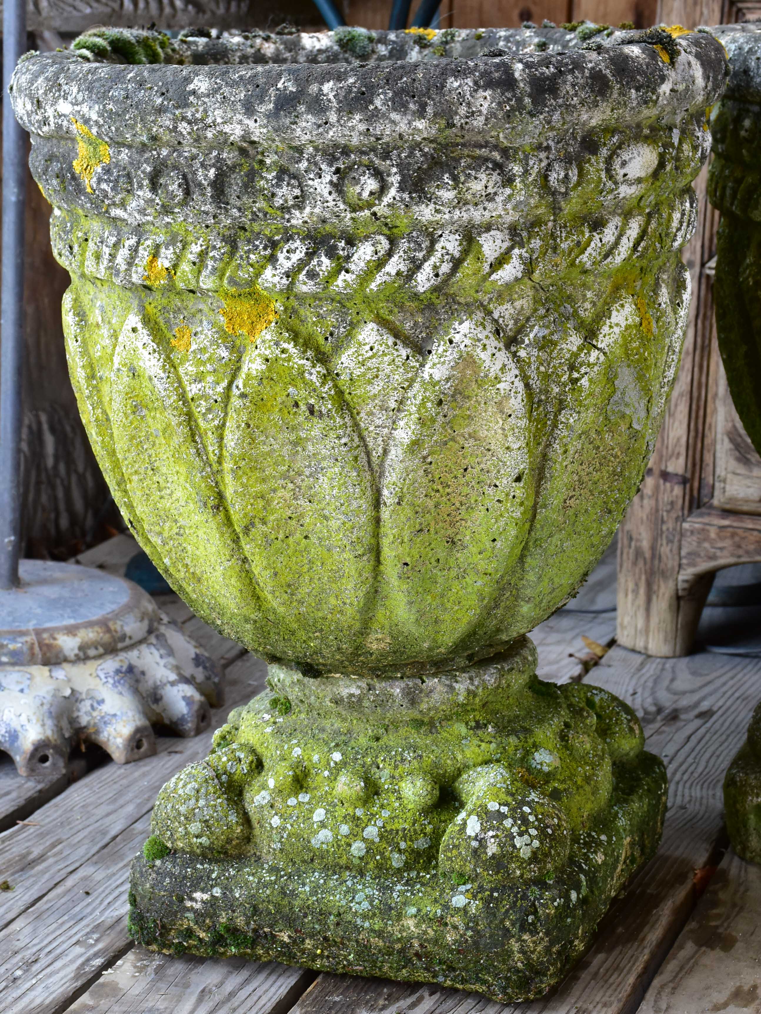 Four antique French garden pots on pedestals