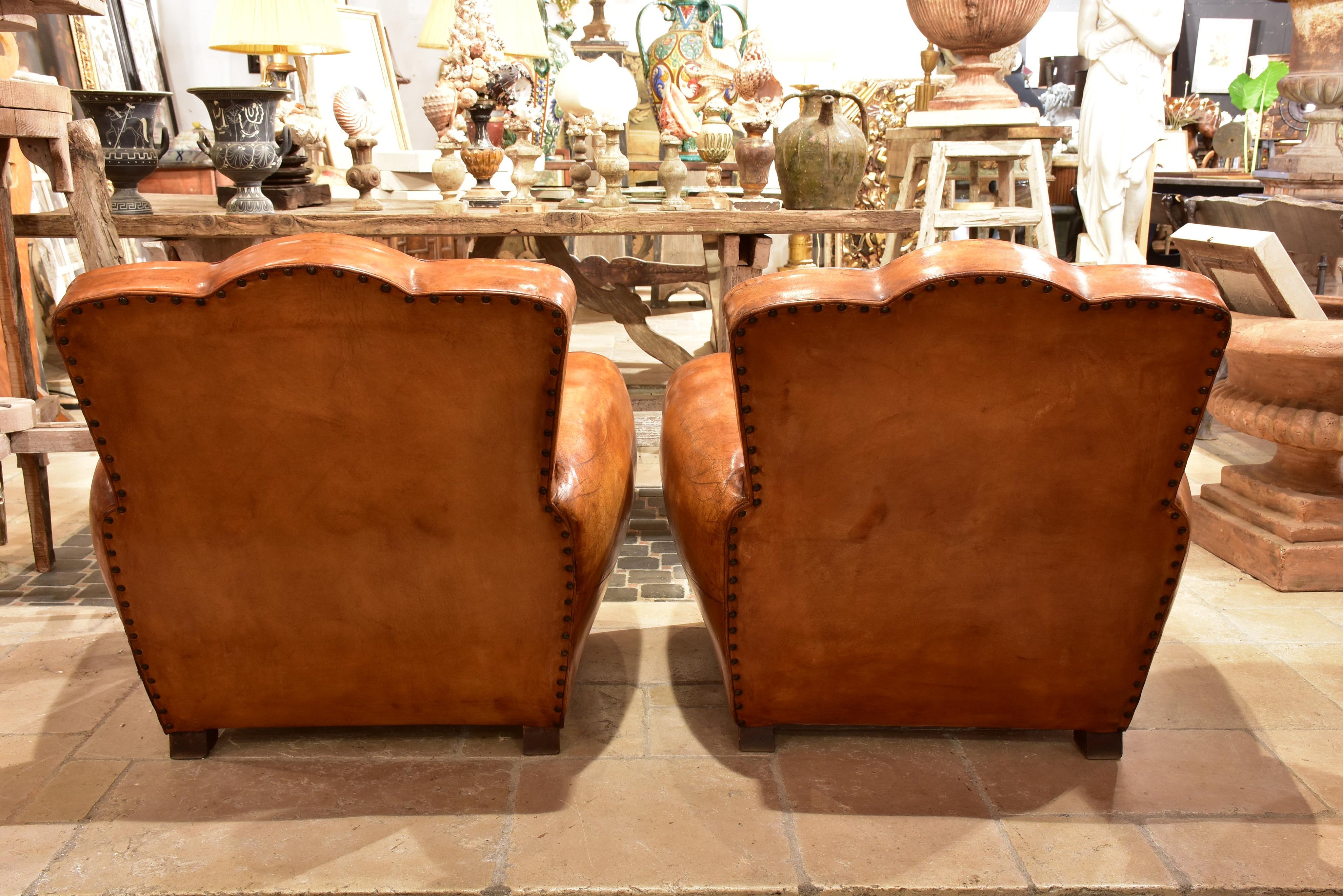 Pair of French chapeau gendarme back club chairs