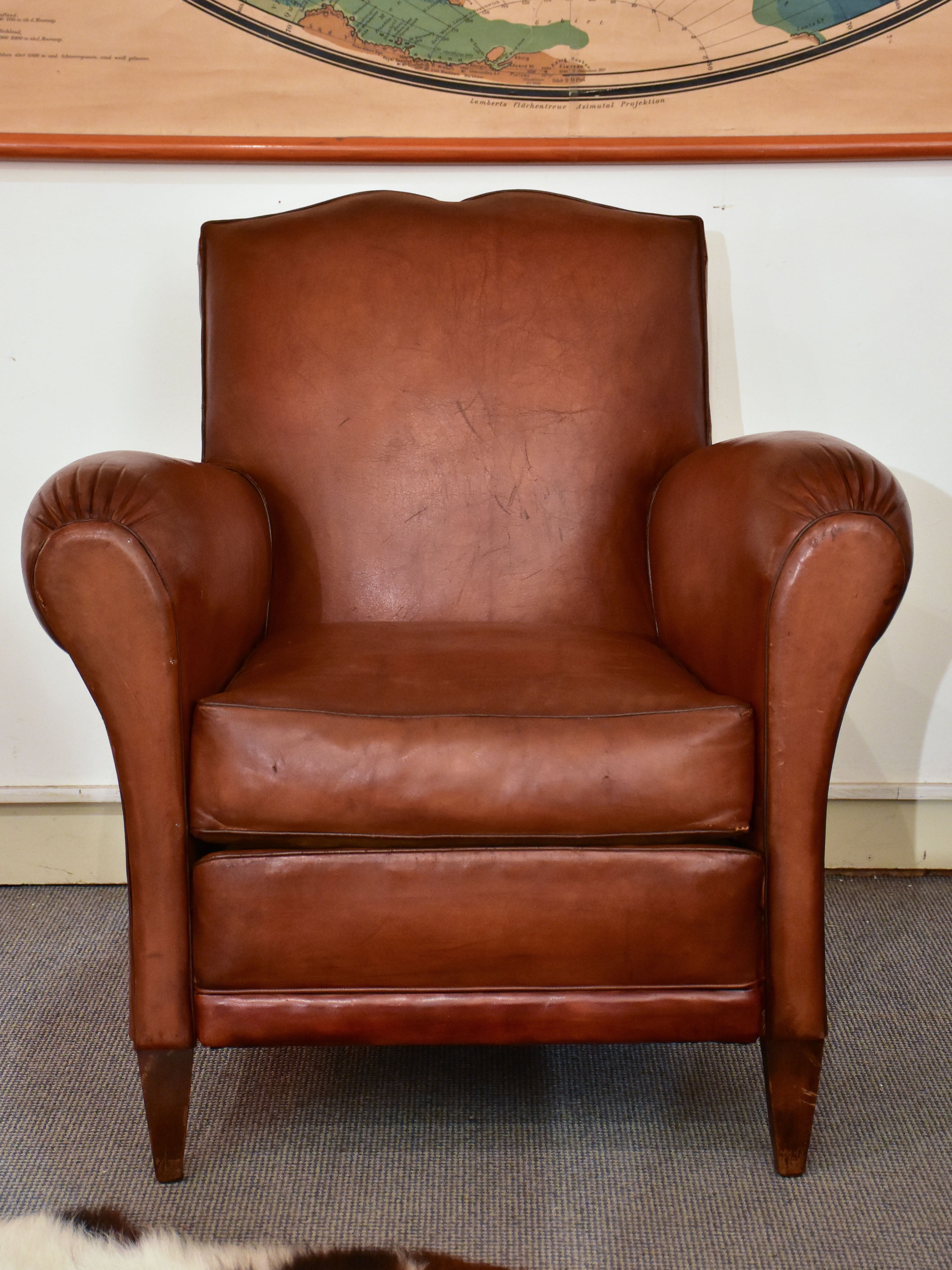 Petite 1950's French leather club chair with moustache back