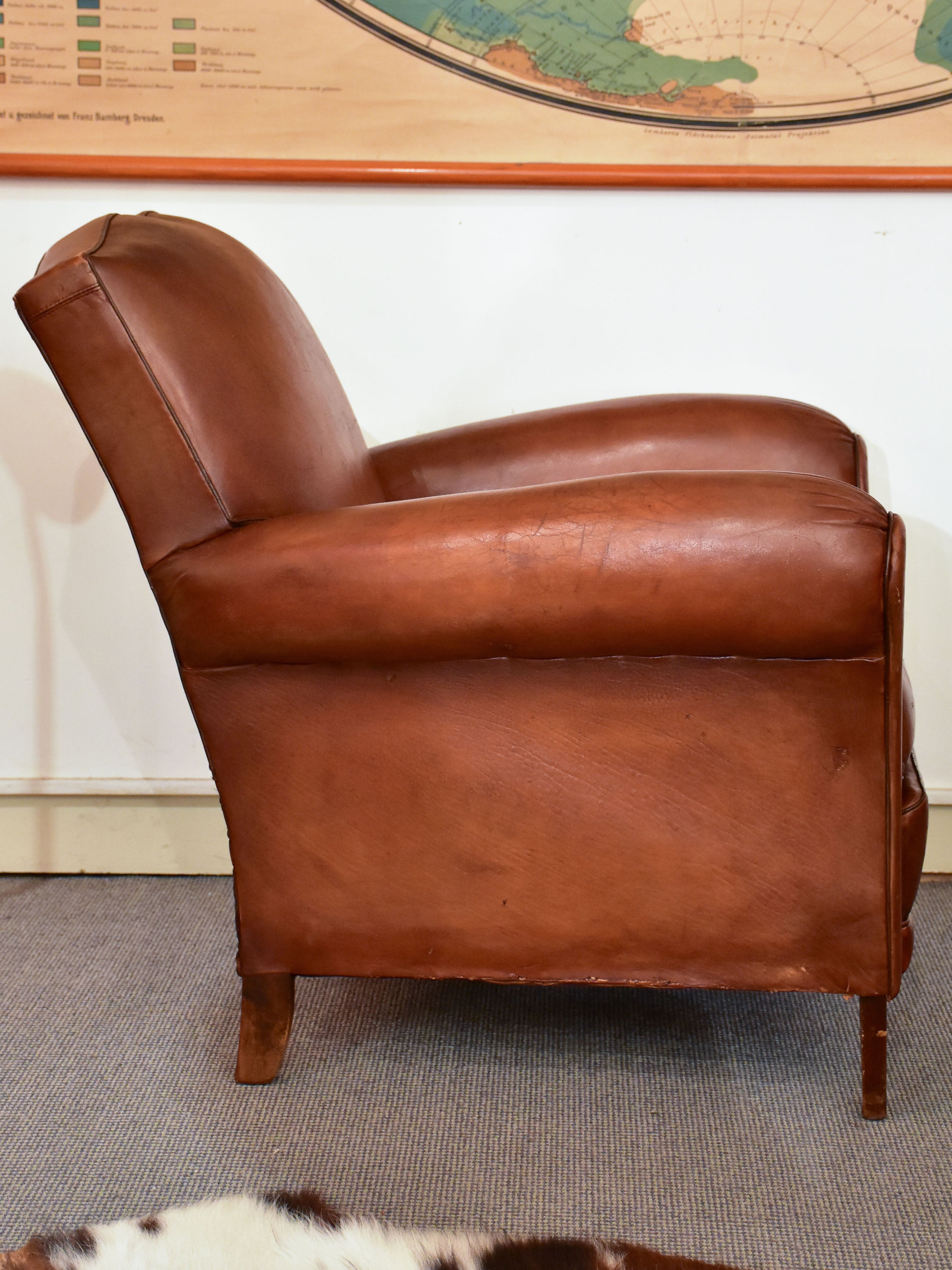 Petite 1950's French leather club chair with moustache back