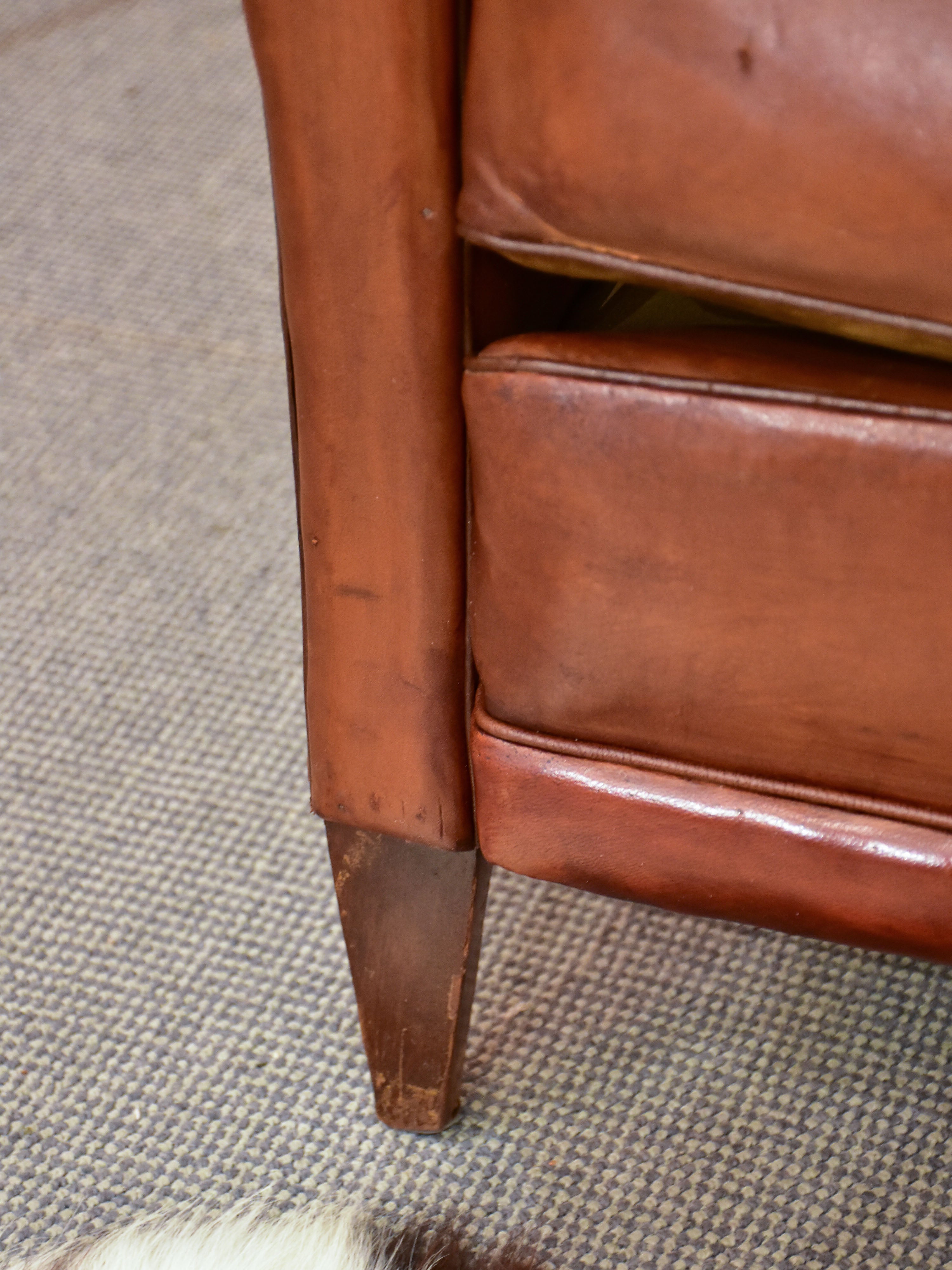 Petite 1950's French leather club chair with moustache back